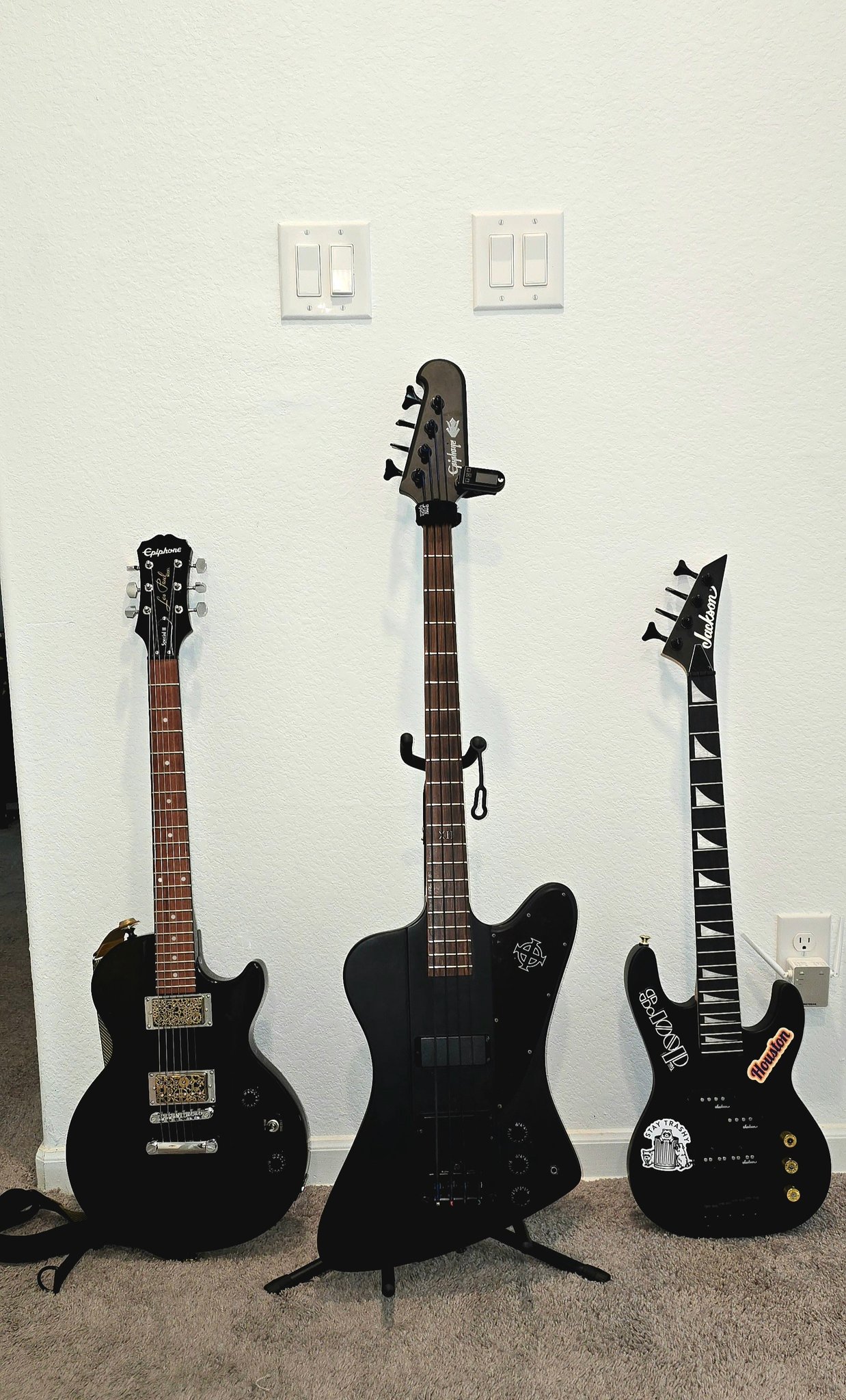 Jackson JS2, Epiphone Goth Thunderbird, and Duff Signature Fender