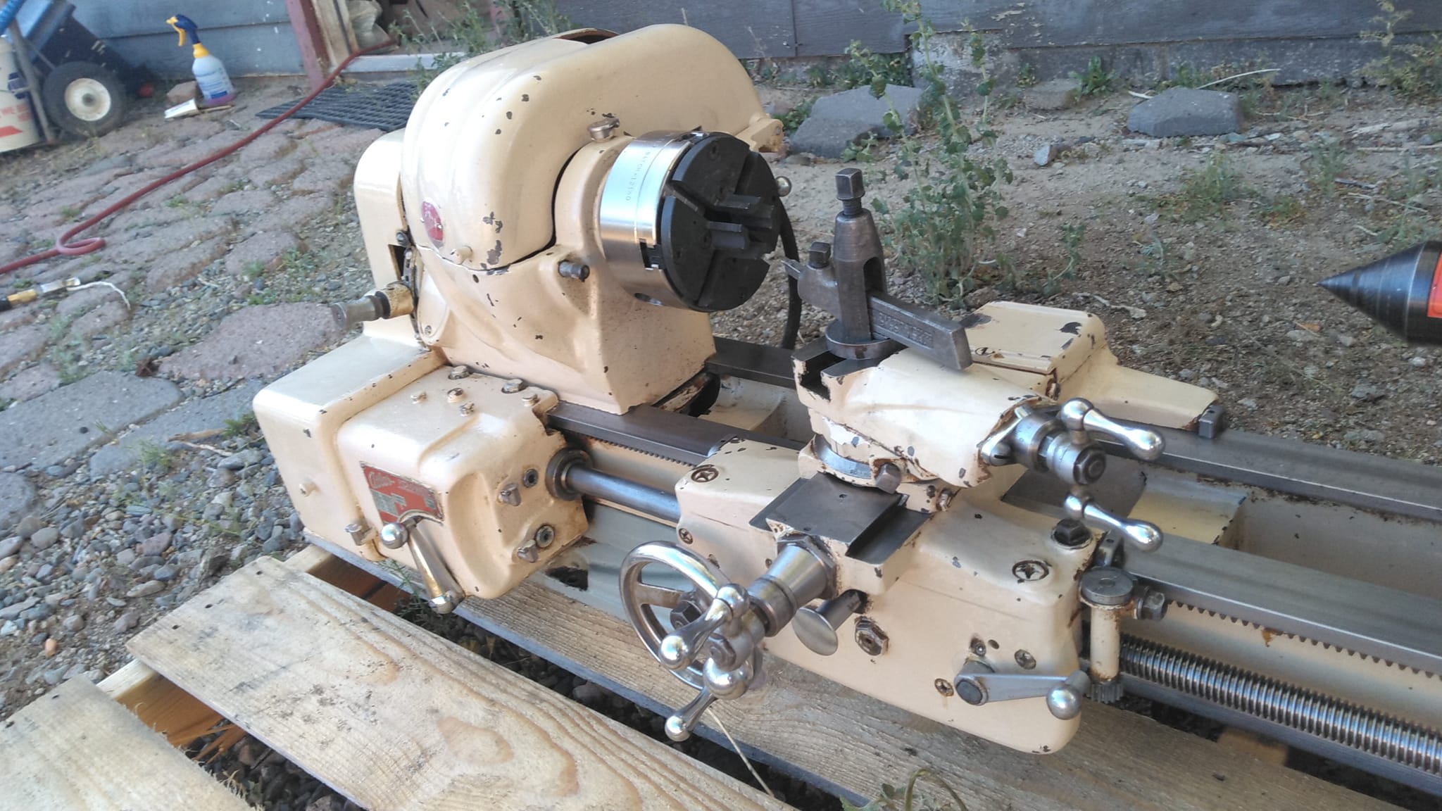 What is the vintage and model number of the Atlas lathe?