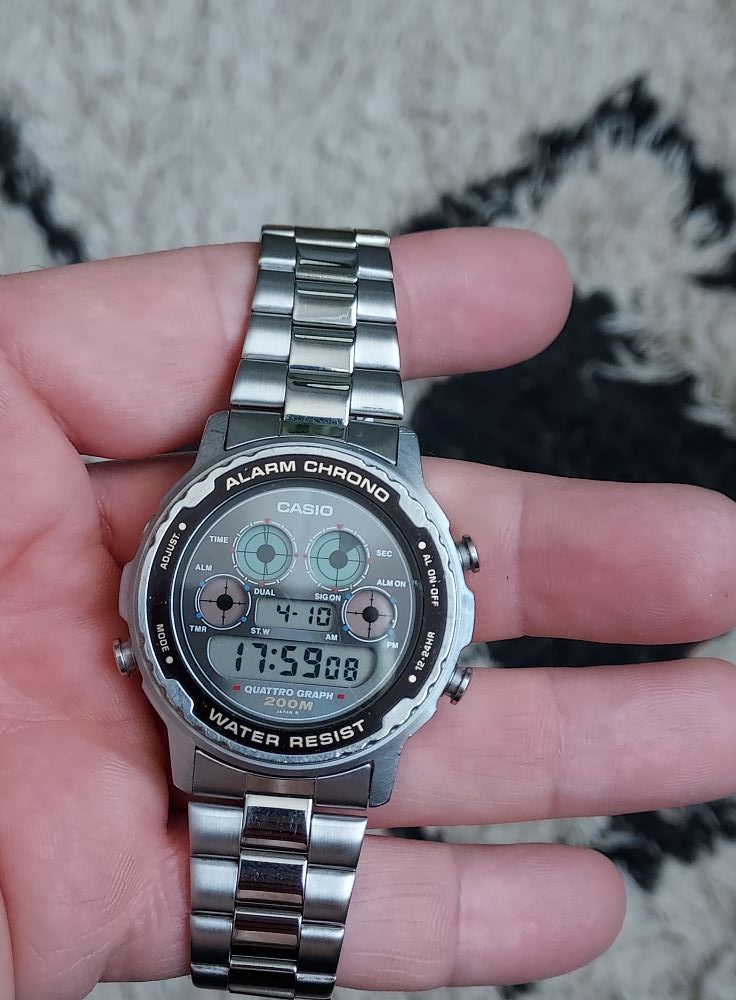 Casio Quattro Graph 🟠. 90's CASIO TIME LA 越MON PM ل DUAL おの ON