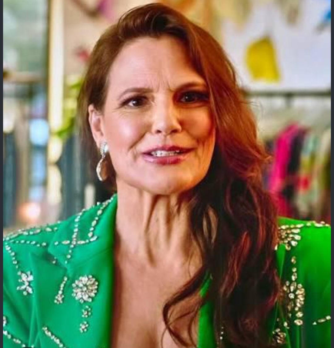 rebecca ted lasso green dress and Keeley's suits at lunch evoke Romy and Michele vibes ruffle skirt wedding dress