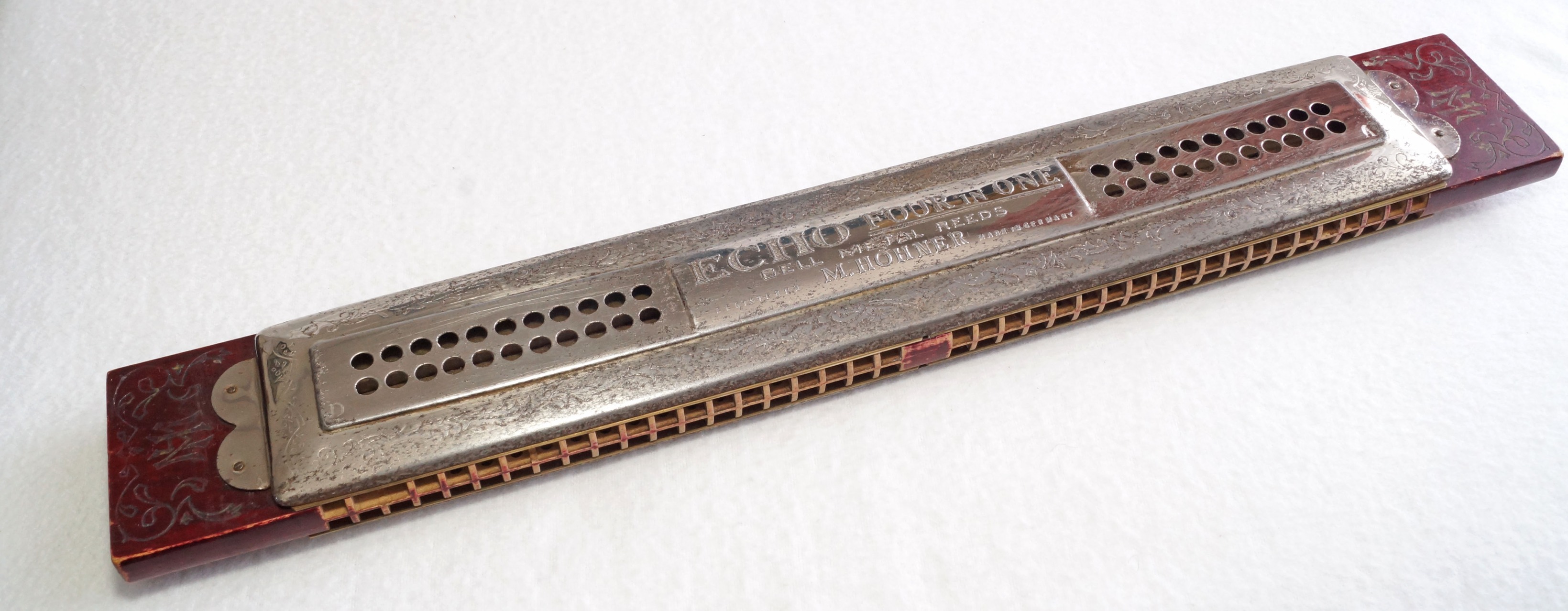 Goldplated Echo Phone Mod 3810 Hohner harmonica for sale