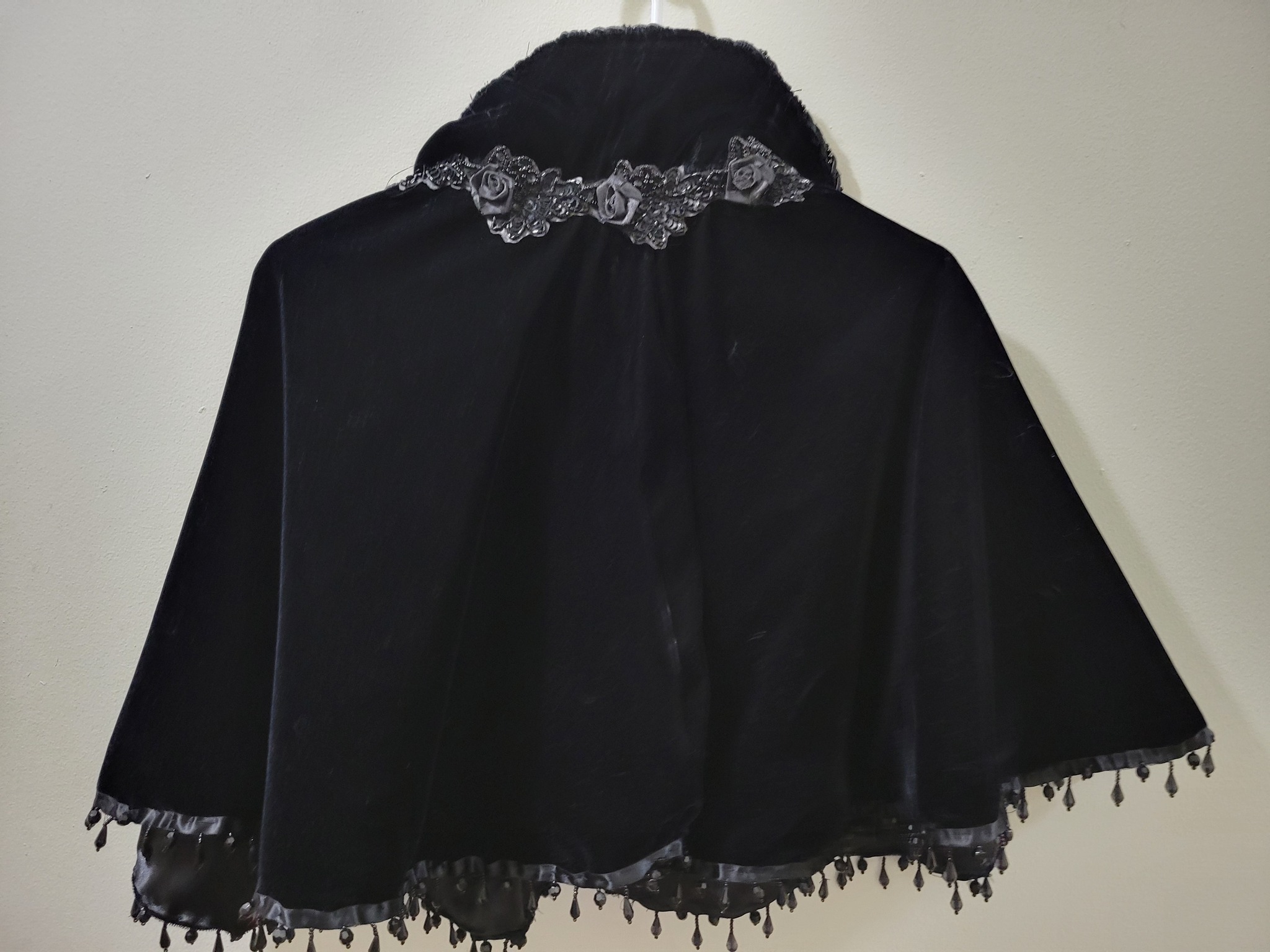 Victorian-style wool winter cape with high collar
