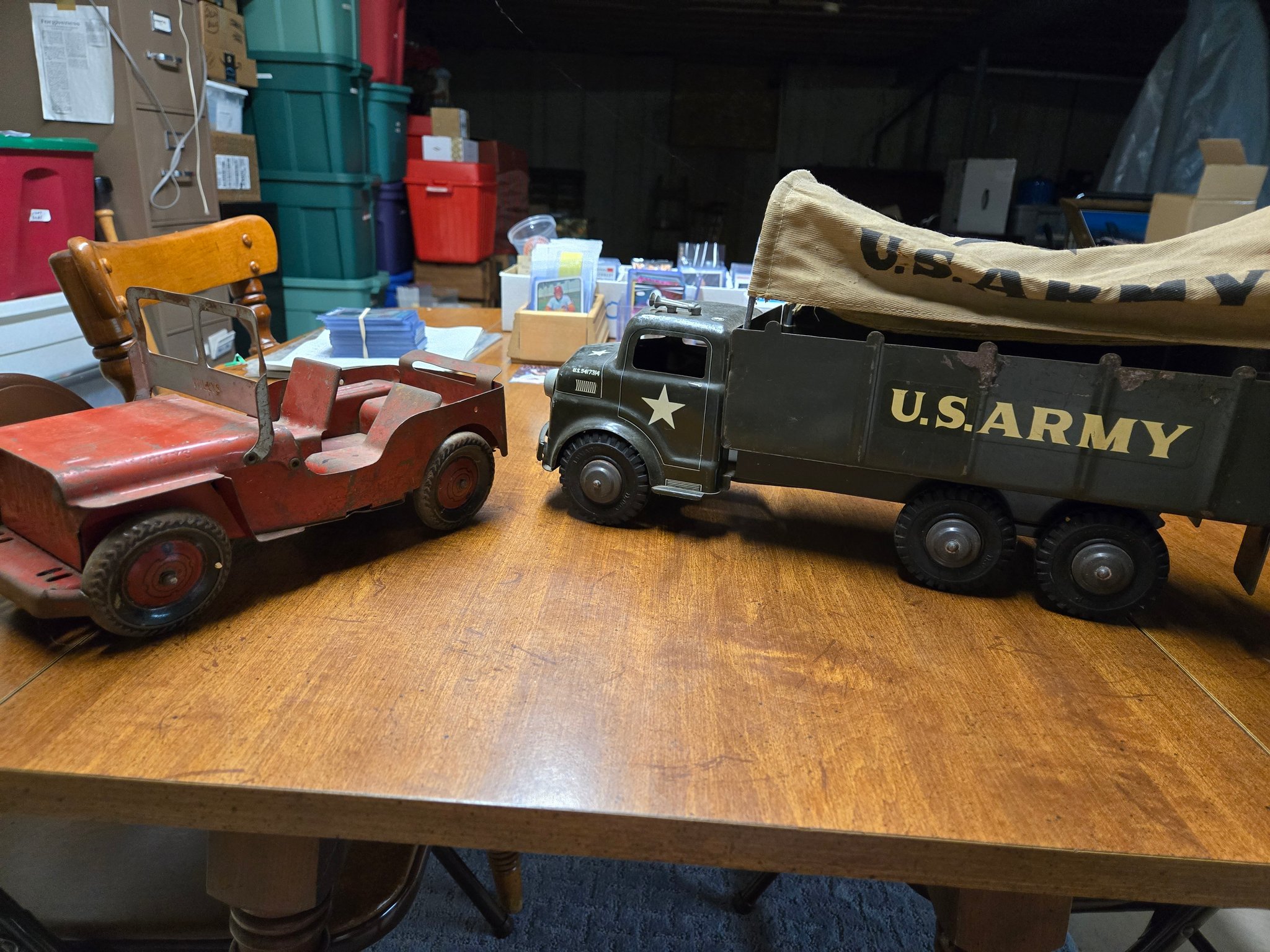 Vintage toy army vehicles from the 1950s