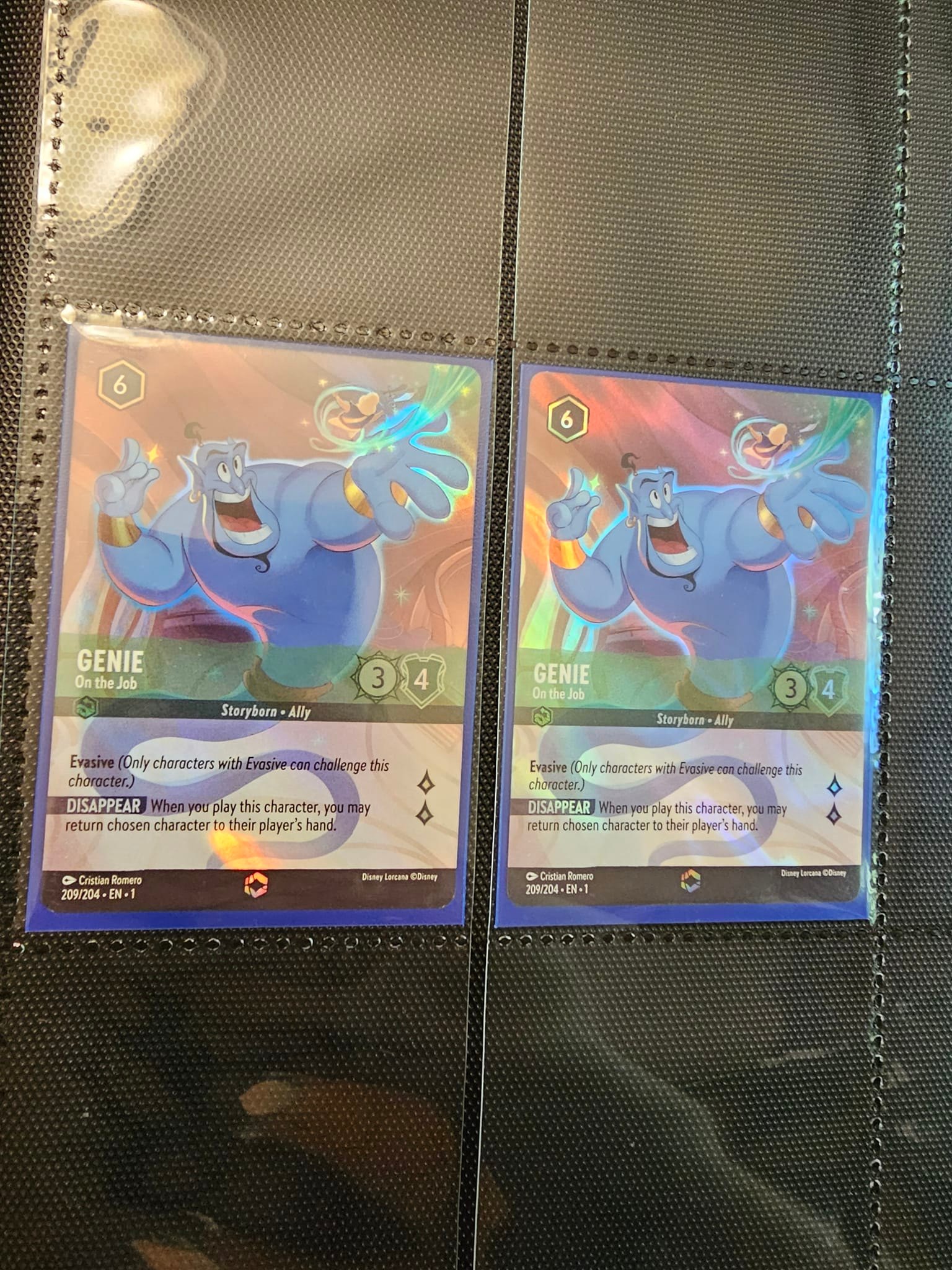 Pulling Aladdin and Genie card in Disney Lorcana TCG