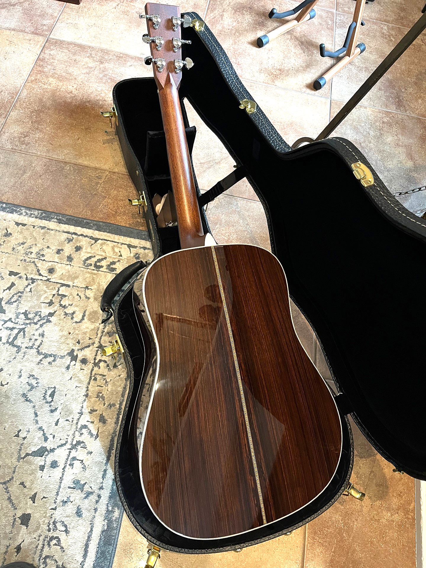 A beautiful 2012 Martin HD28, with the plastic still on the