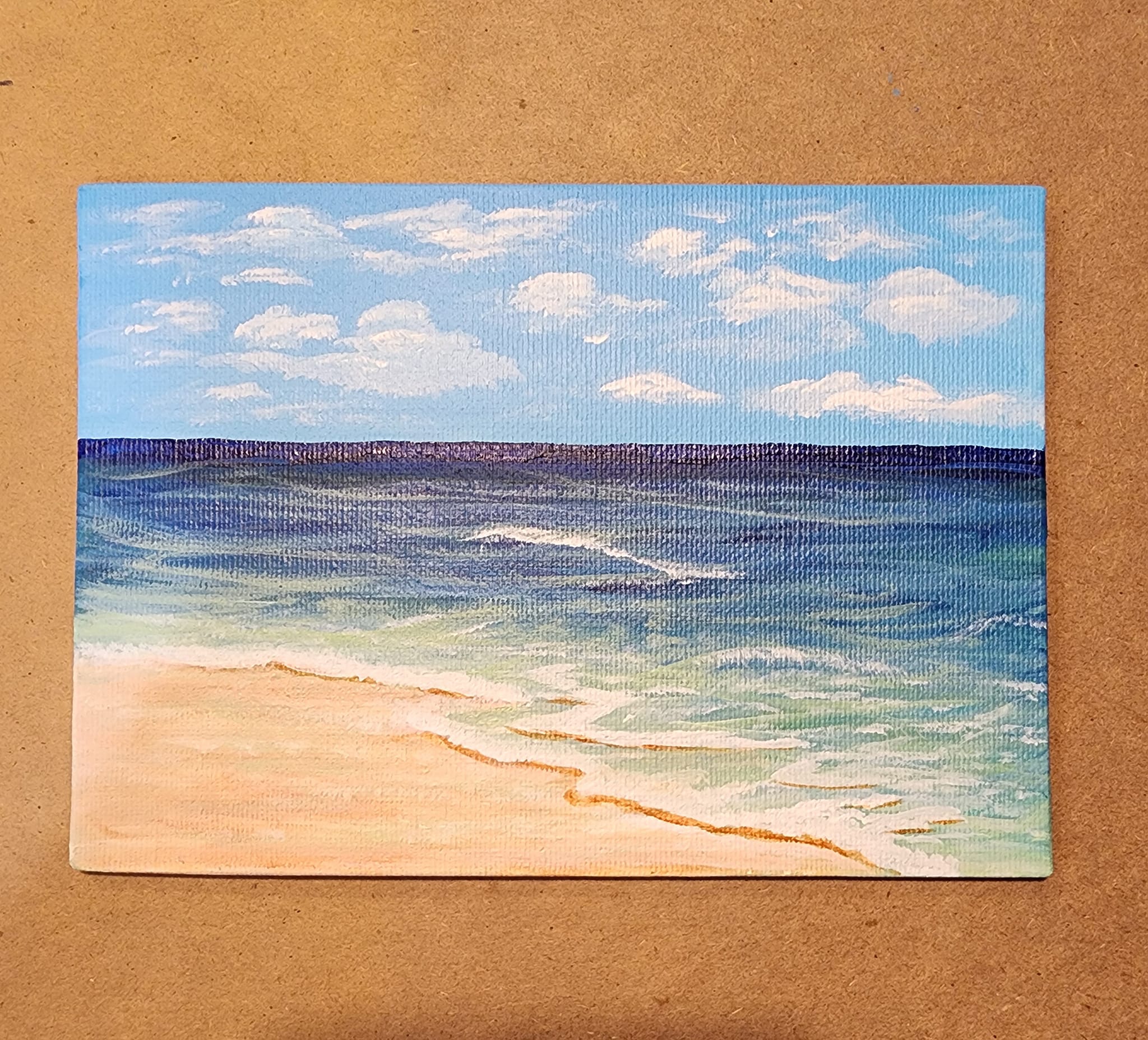 How to transition sand and water in a seascape painting?