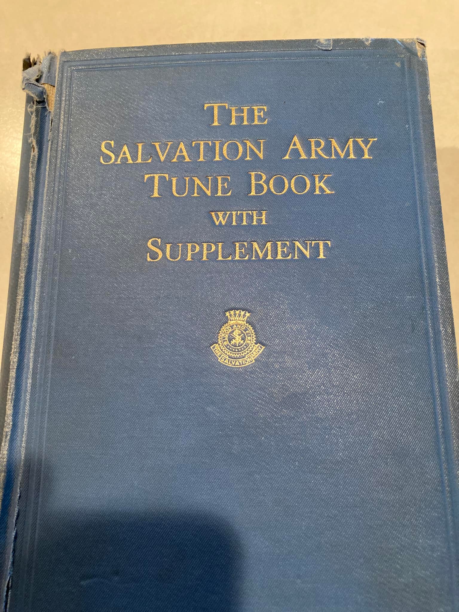 Using magnetic bookmarks in Salvation Army tune book for brass band