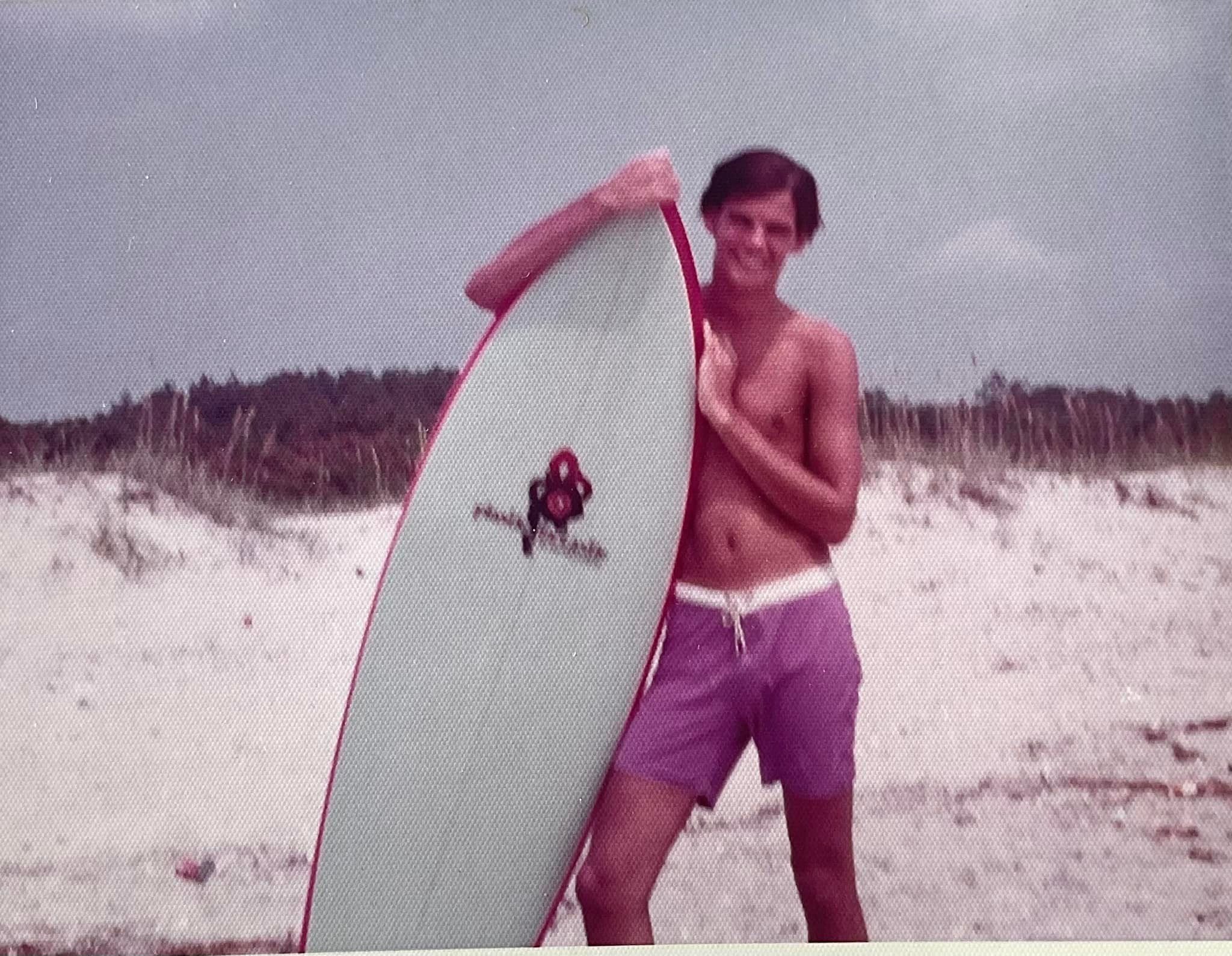 My brother with his plastic fantastic surfboard, probably around