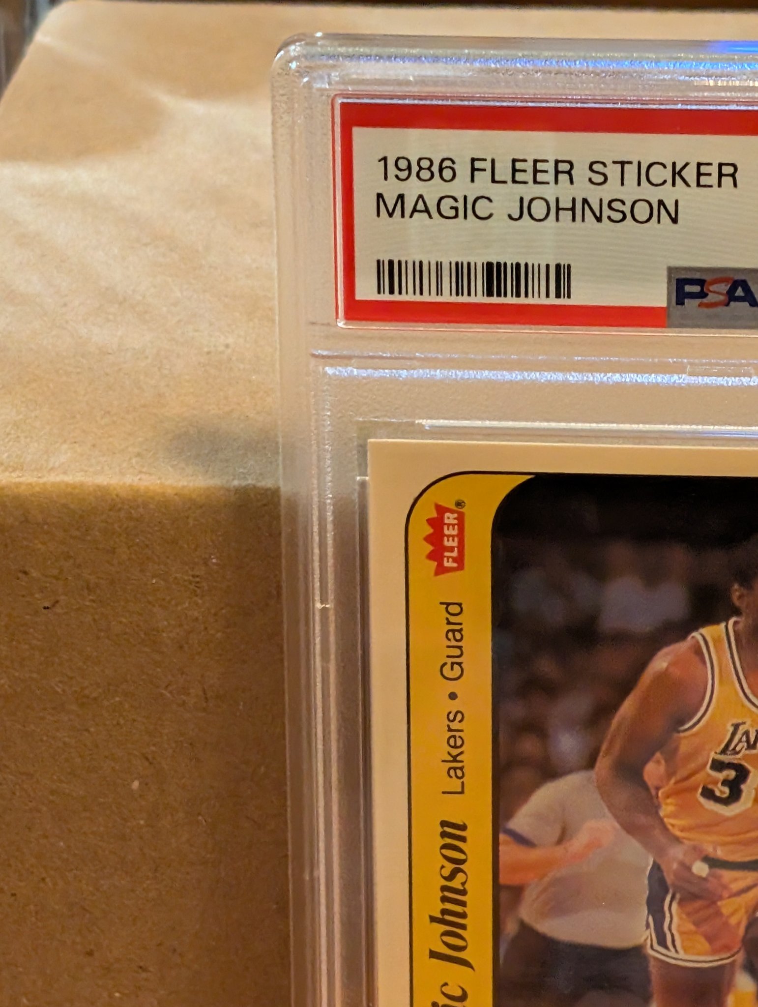 Why did my 1986 Fleer PSA 4 sticker get this grade?
