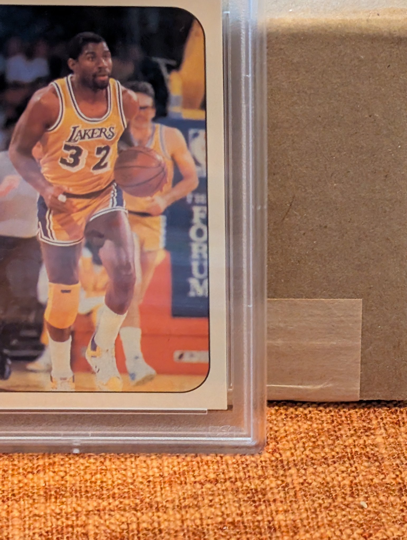 Why did my 1986 Fleer PSA 4 sticker get this grade?