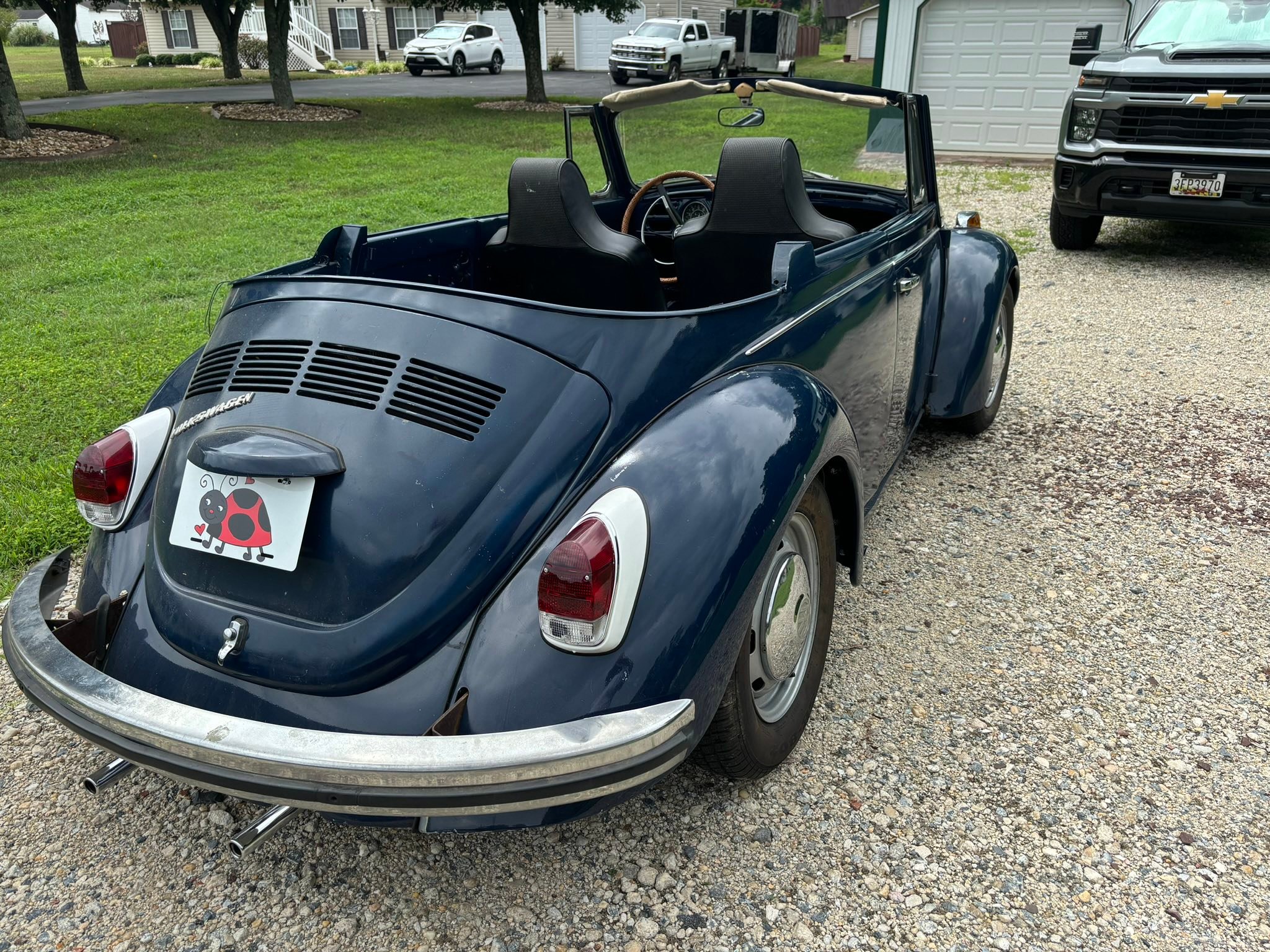 1967 VW Beetle convertible painted in hippy style. 2/2