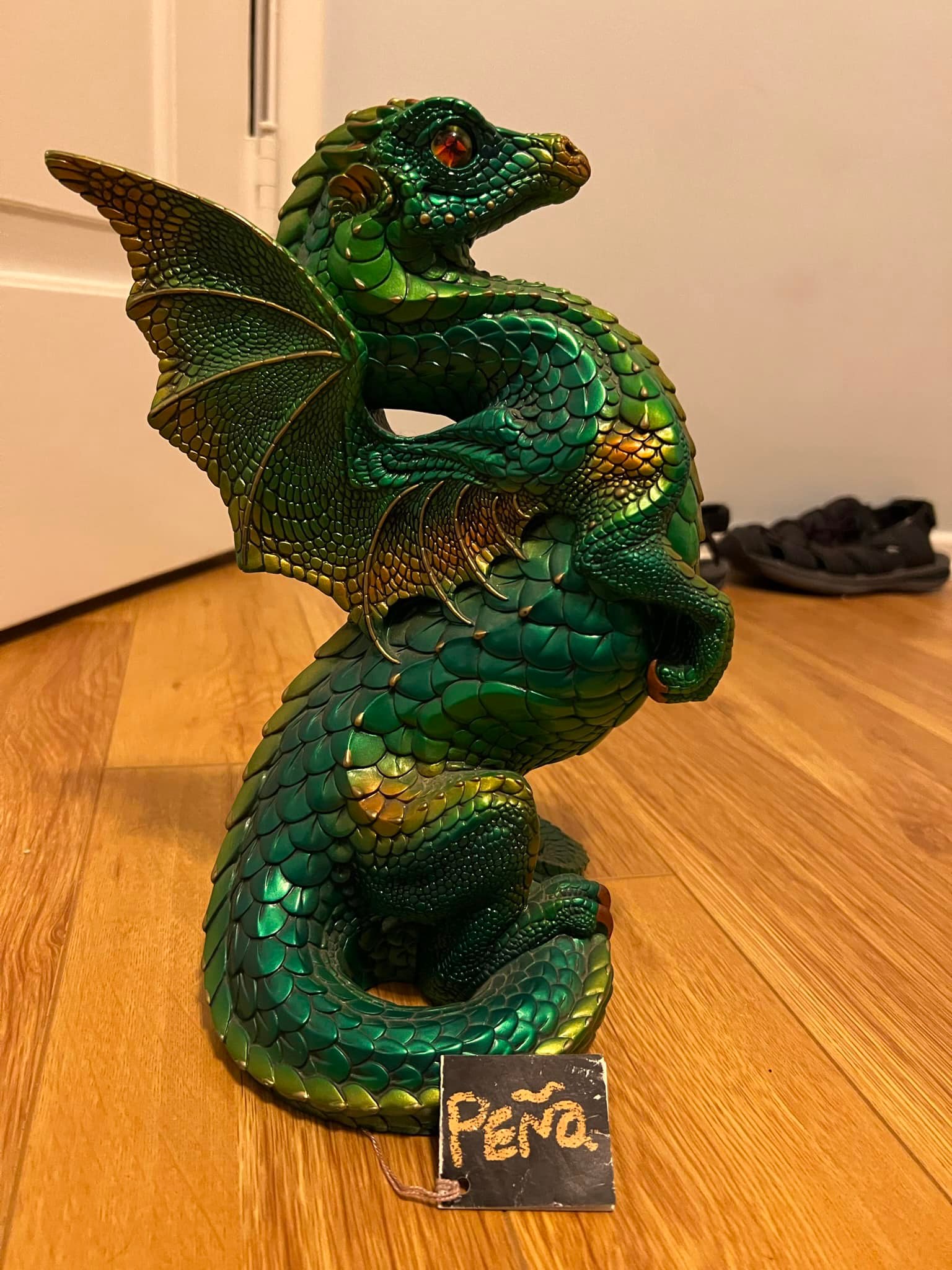 What is the value of vintage Windstone green emerald dragons?