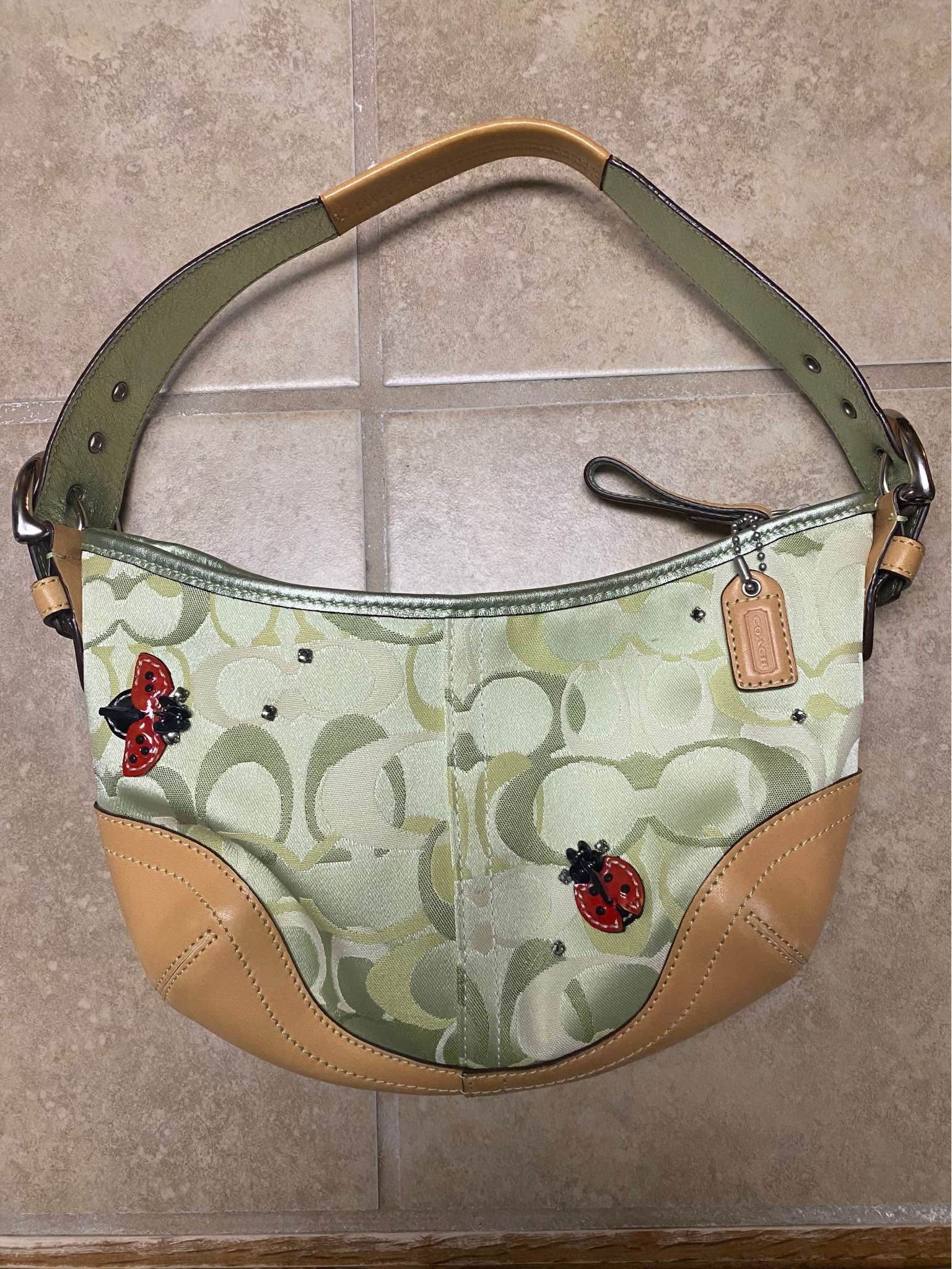 Coach 2005 Limited Edition Green Signature C Optic Ladybug adorned 