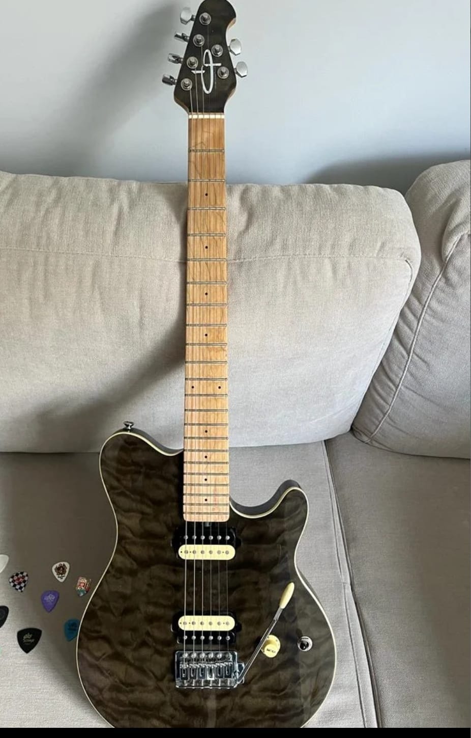 What is an OLP guitar and is it a genuine Ernie Ball Music Man?