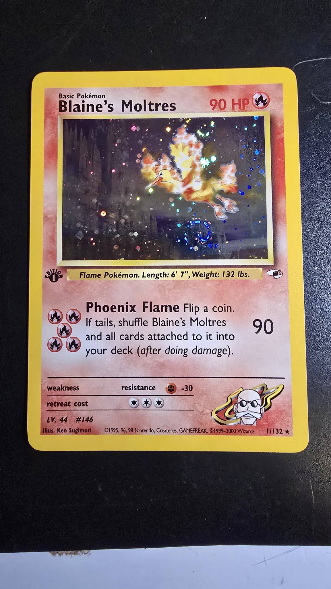 Is Blaine's Moltres Pokémon card with double swirl worth grading?