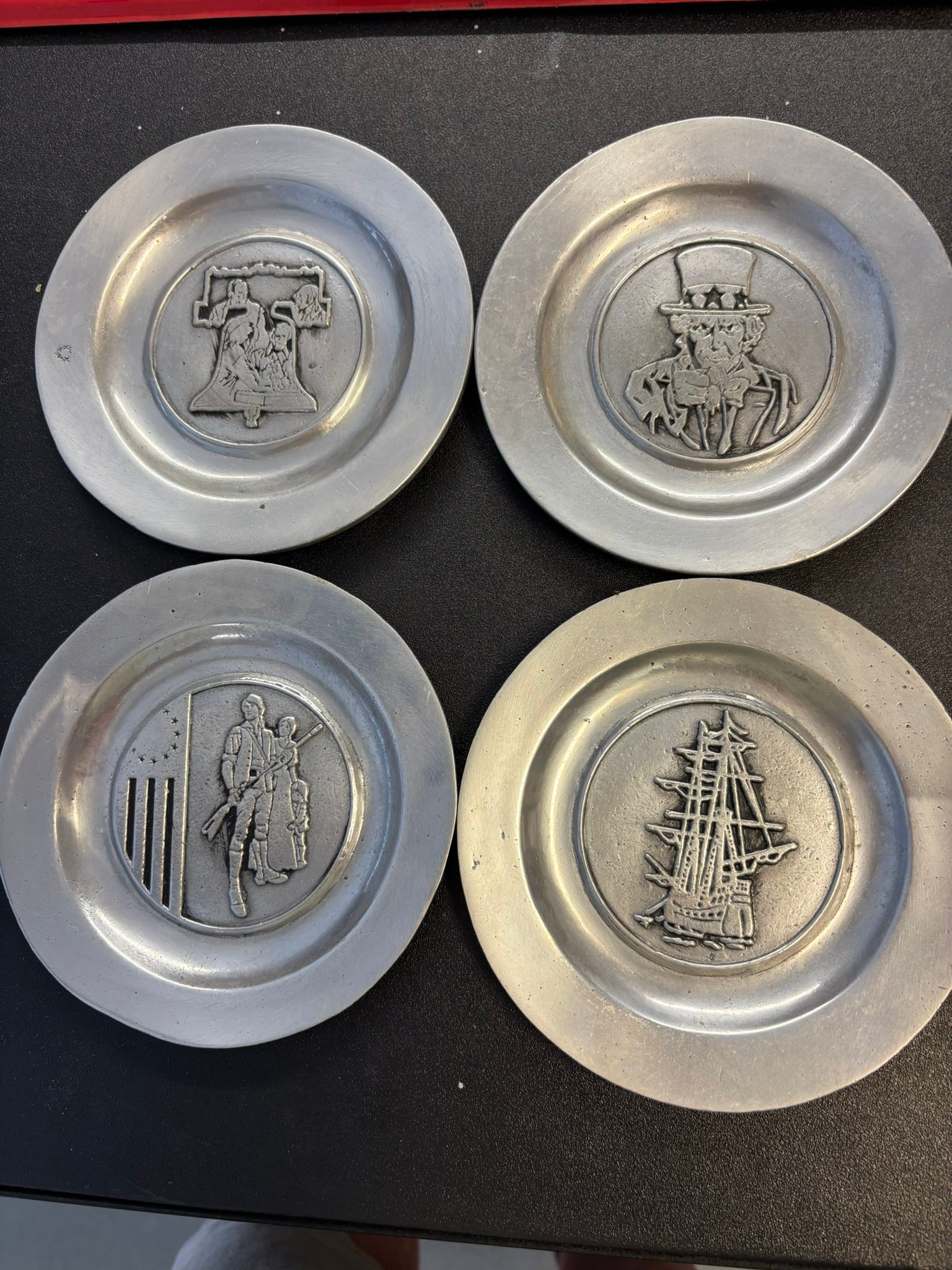 Are plates from Crown Castle Ltd real pewter or an aluminum zinc