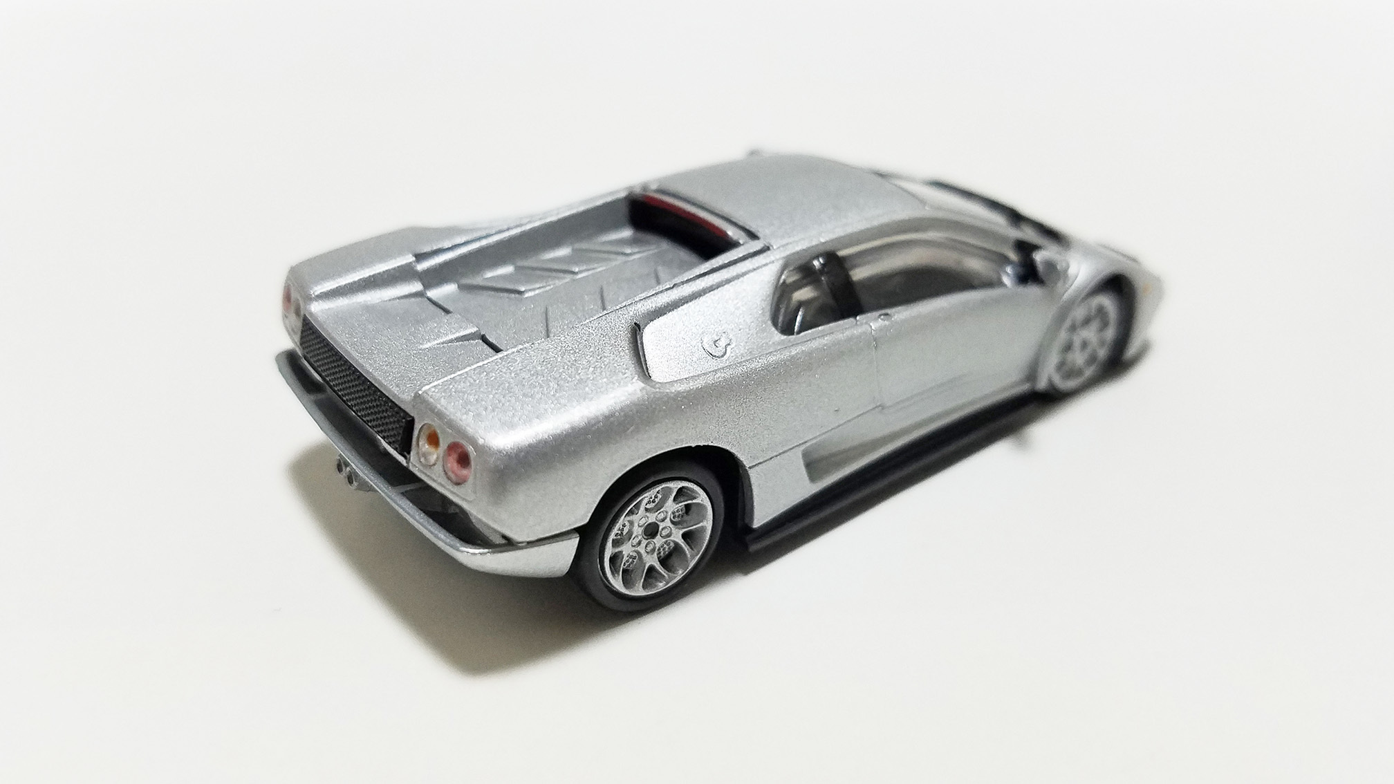 scale & brand: **1/43 Looksmart** year - manufacturer & model