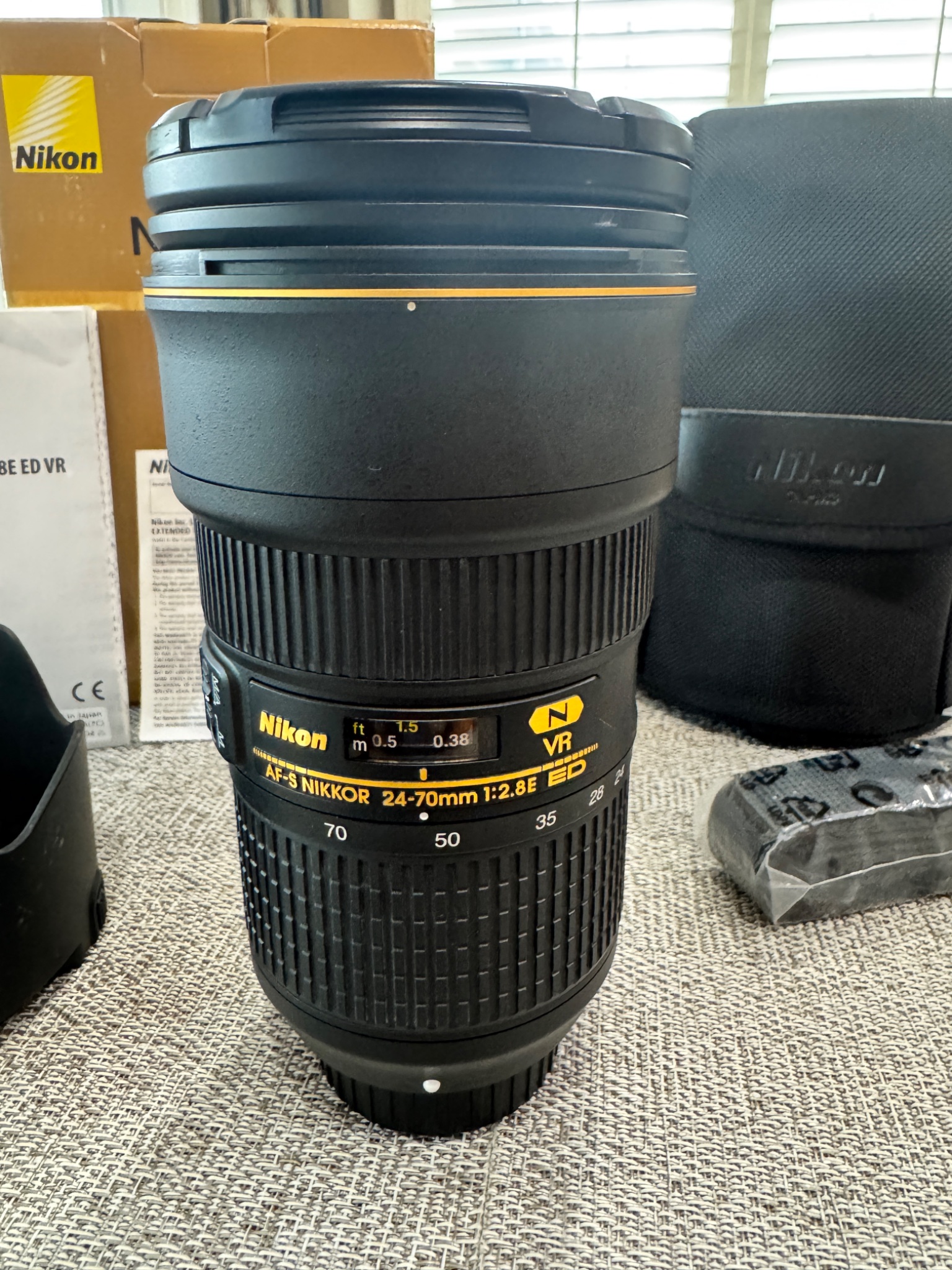 Is VR necessary in the Nikon AF-S NIKKOR 24-70mm f/2.8E lens?