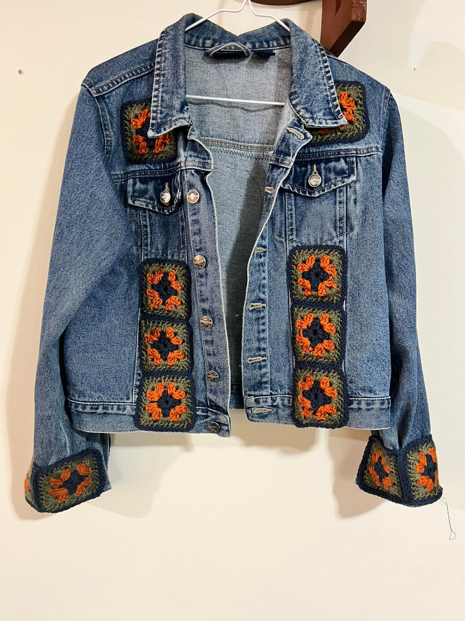 Upcycling a black polyester jacket with crochet squares