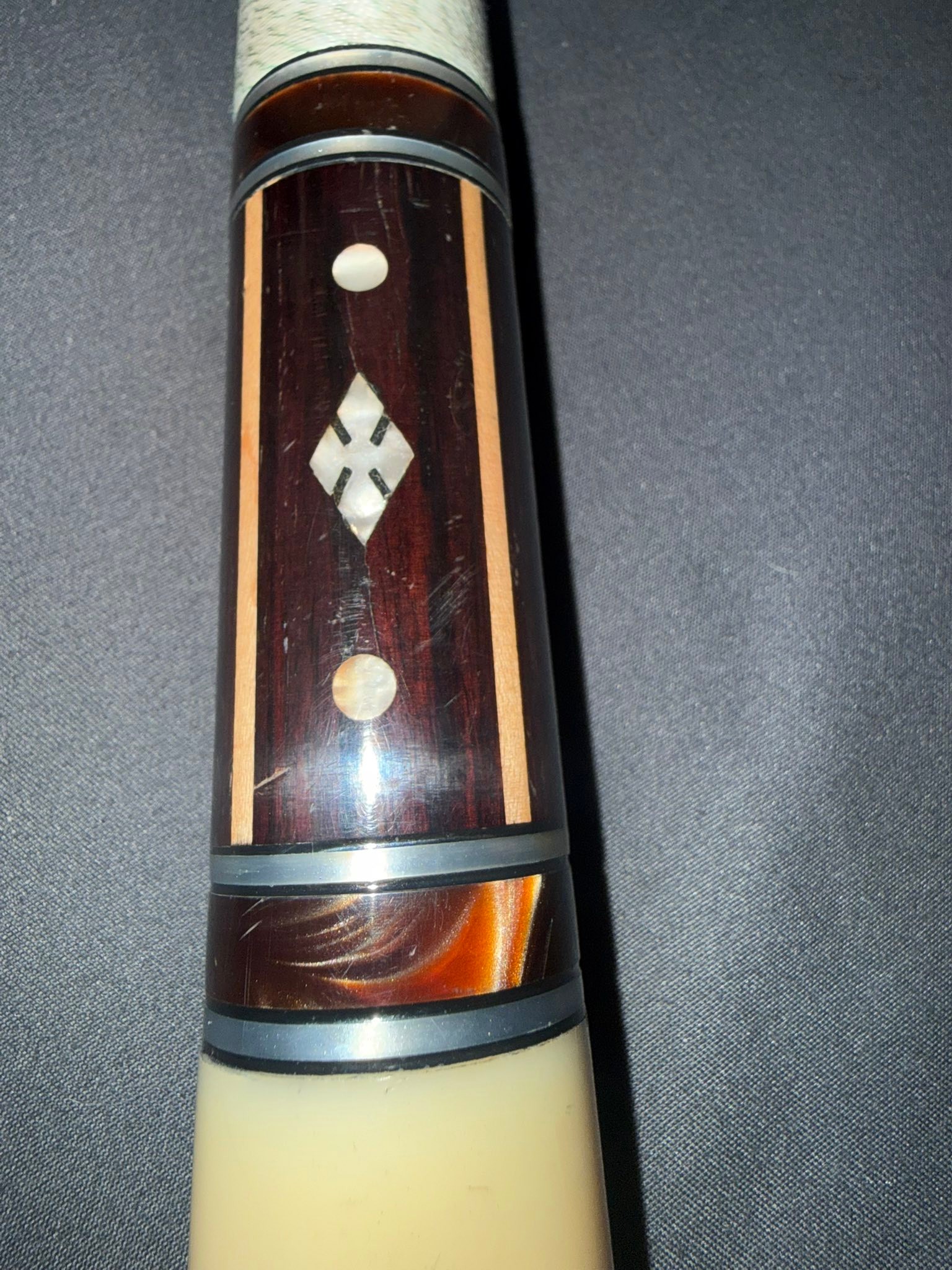 What is this old Adam or Helmstetter pool cue?