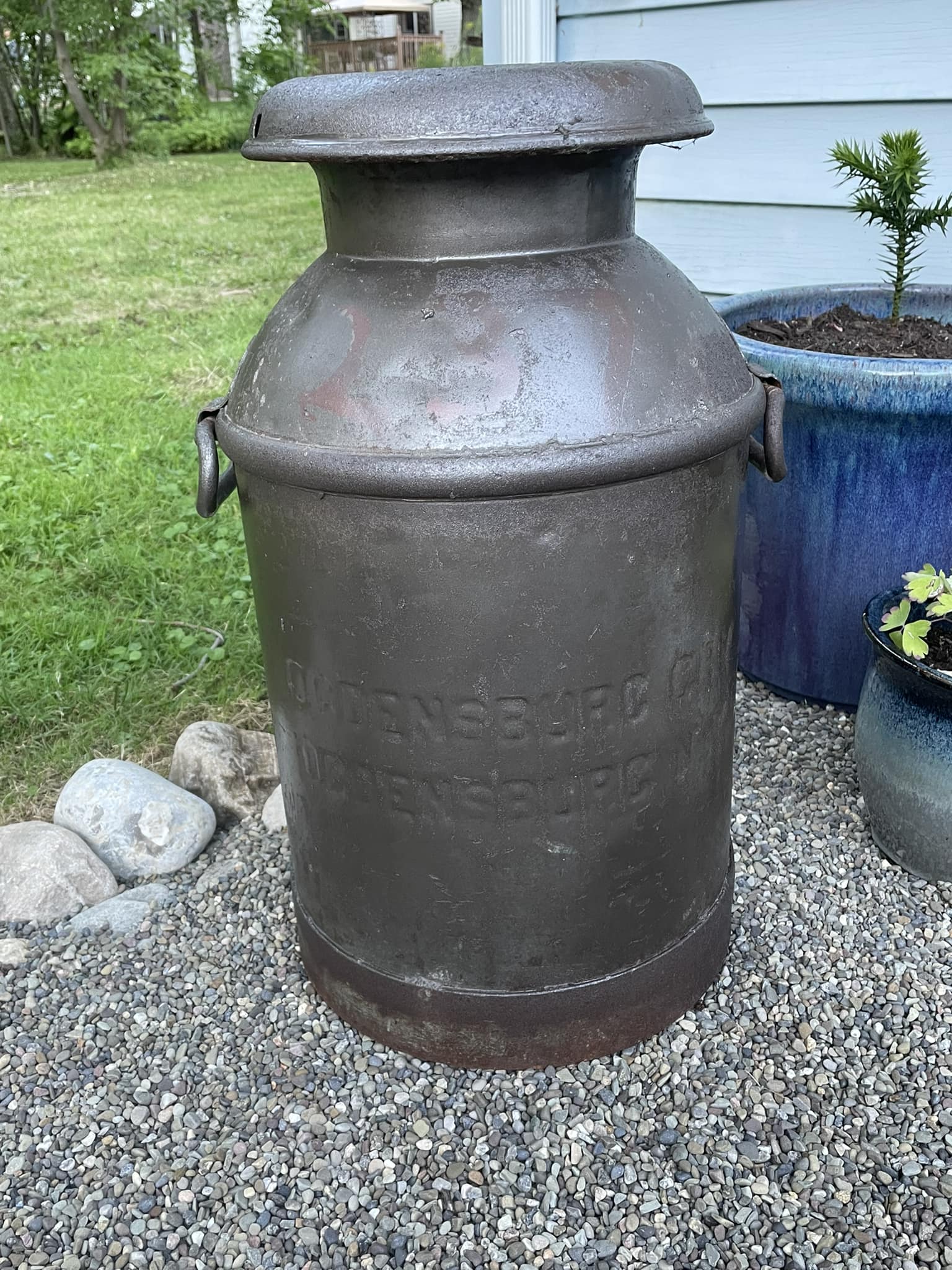 Vintage Ogdensburg Creamery milk can decor