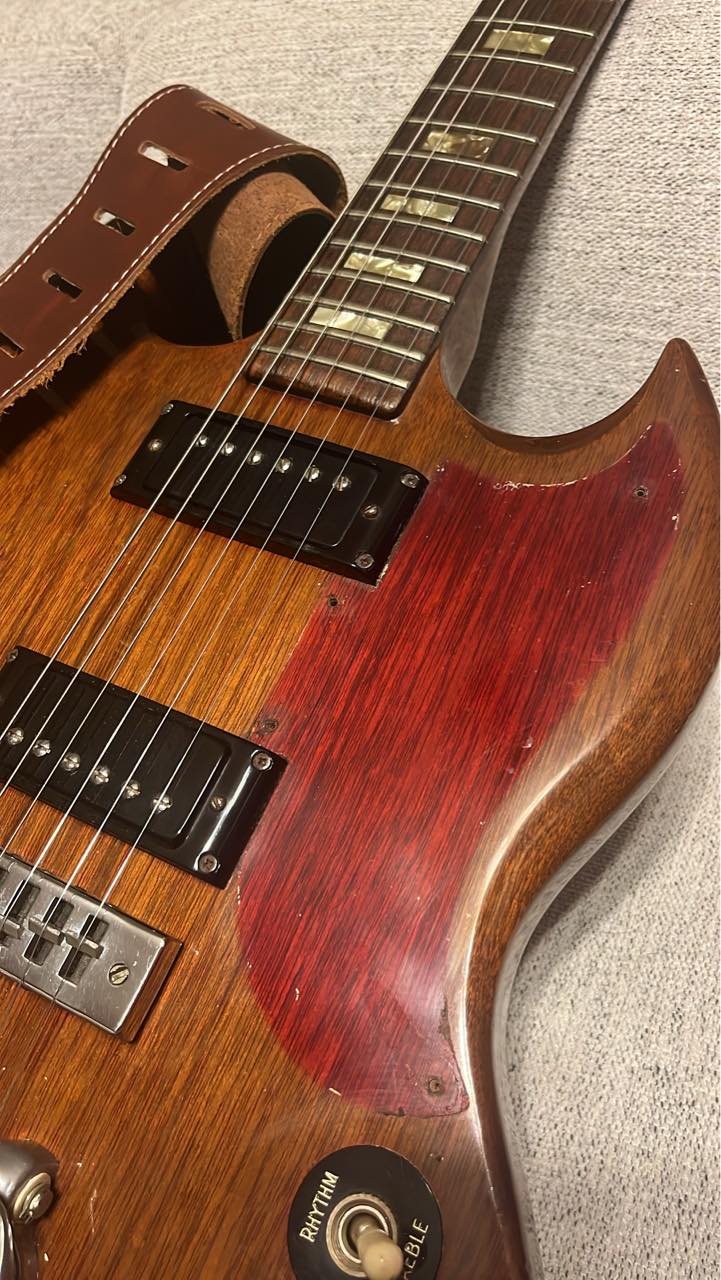 1973 Gibson SG's original cherry finish revealed