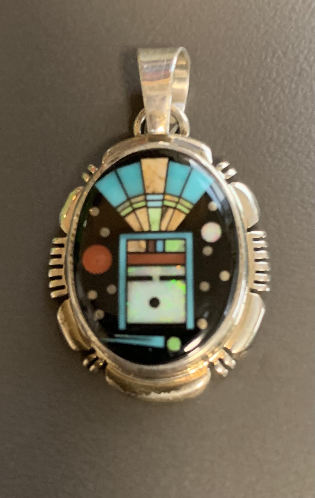 Traditional Navajo silver and stone art by Bo Reeves.