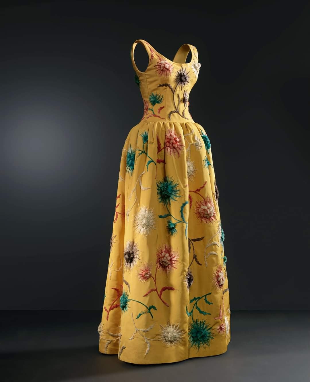 1960 formal dress 1960, Spain Evening by Cristobal Balenciaga Yellow gros de Naples, with embroidery in polychrome chenille floral motifs Cristóbal Balenciaga Museoa homecoming dresses burgundy