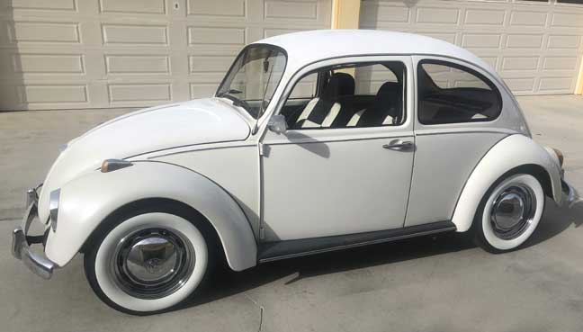 New white wheels installed on vintage Volkswagen