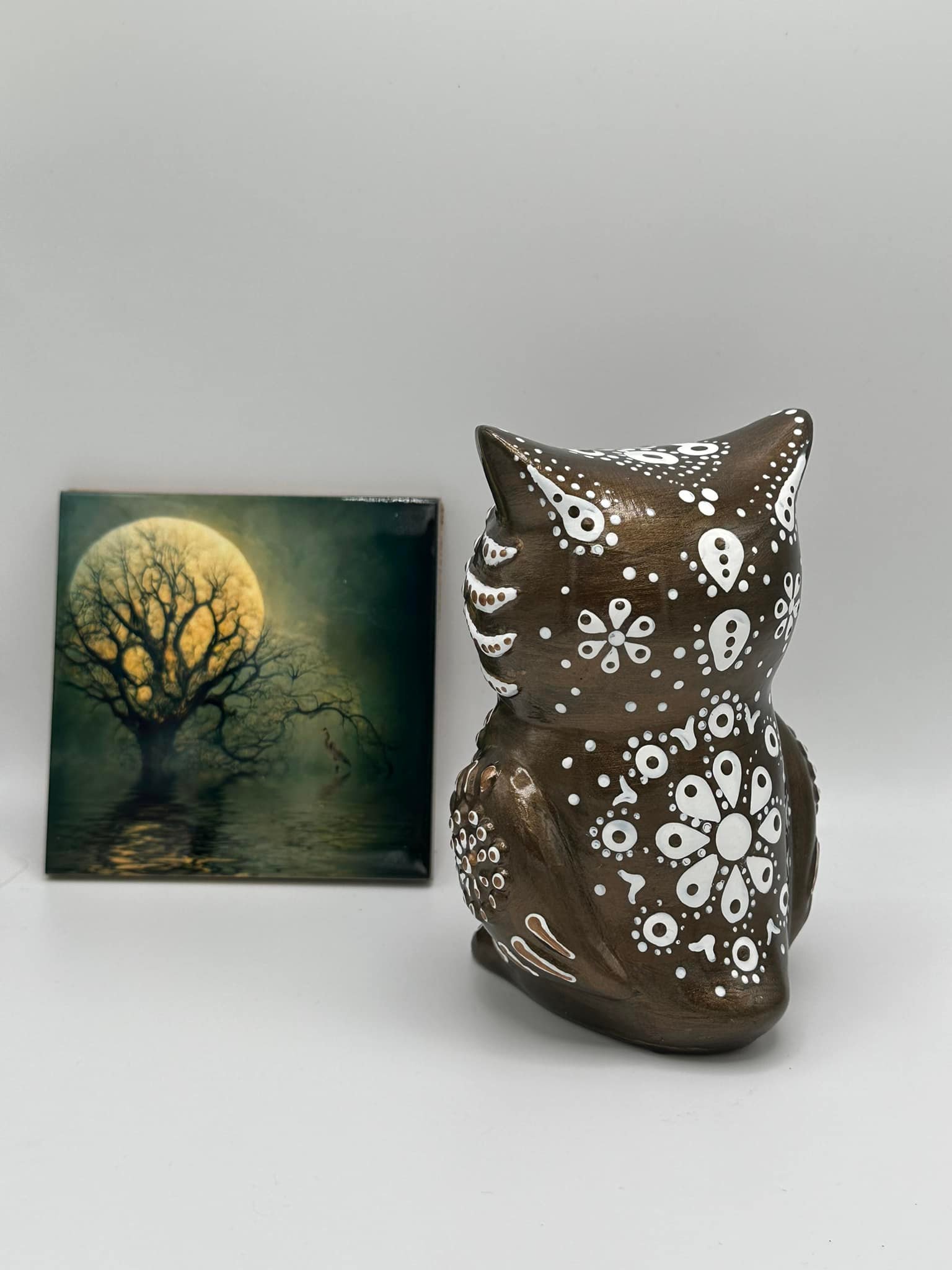 20 inch, insanely heavy, ceramic owl (sorry no banana for scale