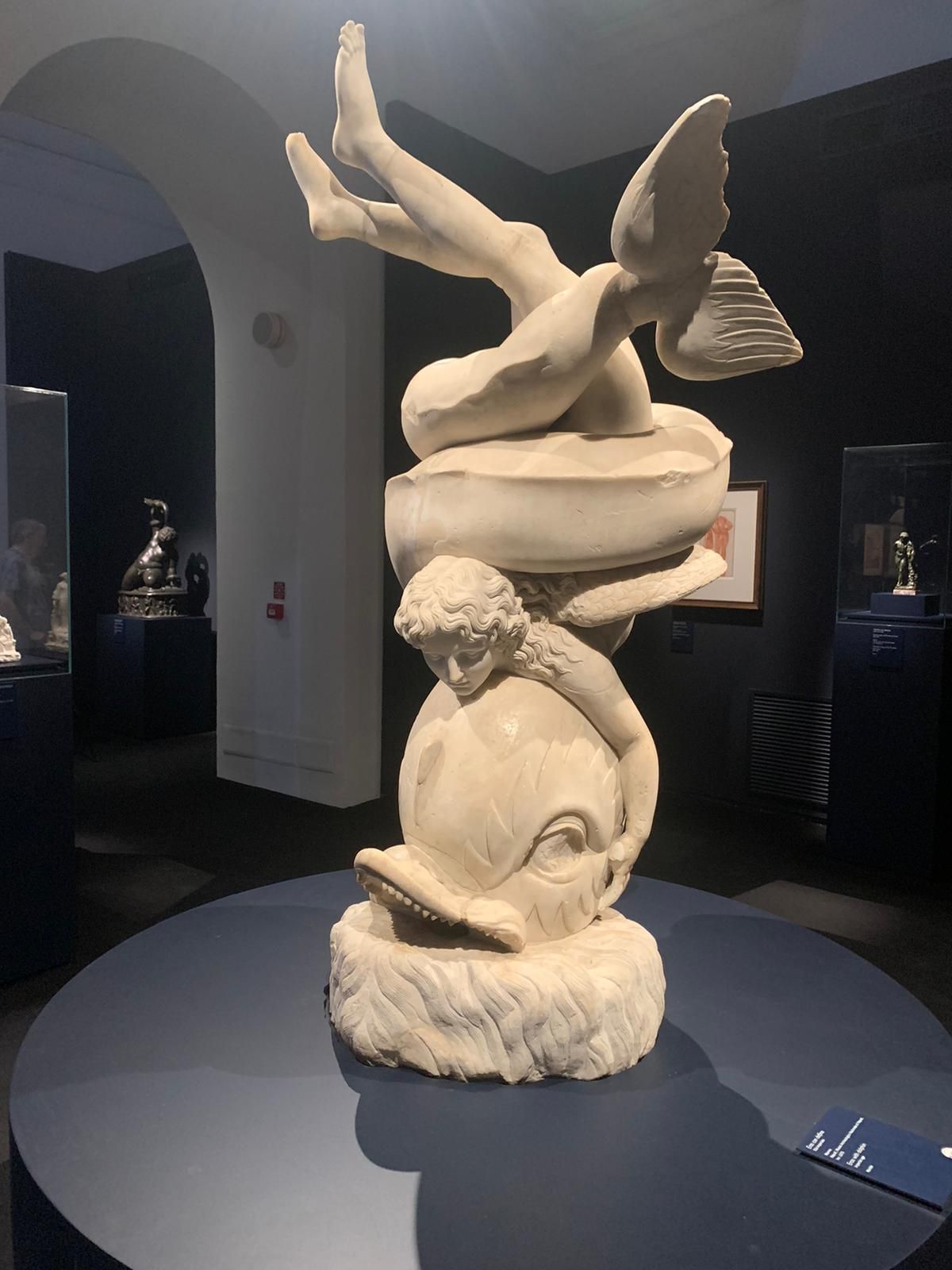 Ancient Roman depiction of dolphins with demonic eyes