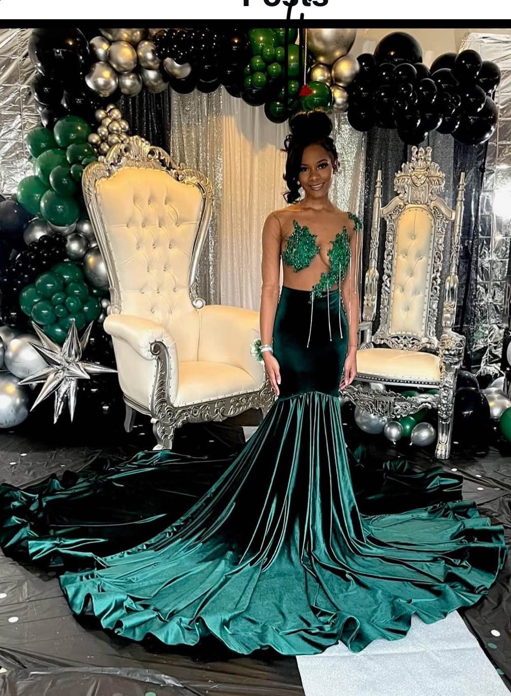 Gorgeous emerald green prom dress. Velvet mermaid style, long train. Sheer top, pretty green appliqués. Open back with cool button details. Worn once for prom. 1000.00 or best offer