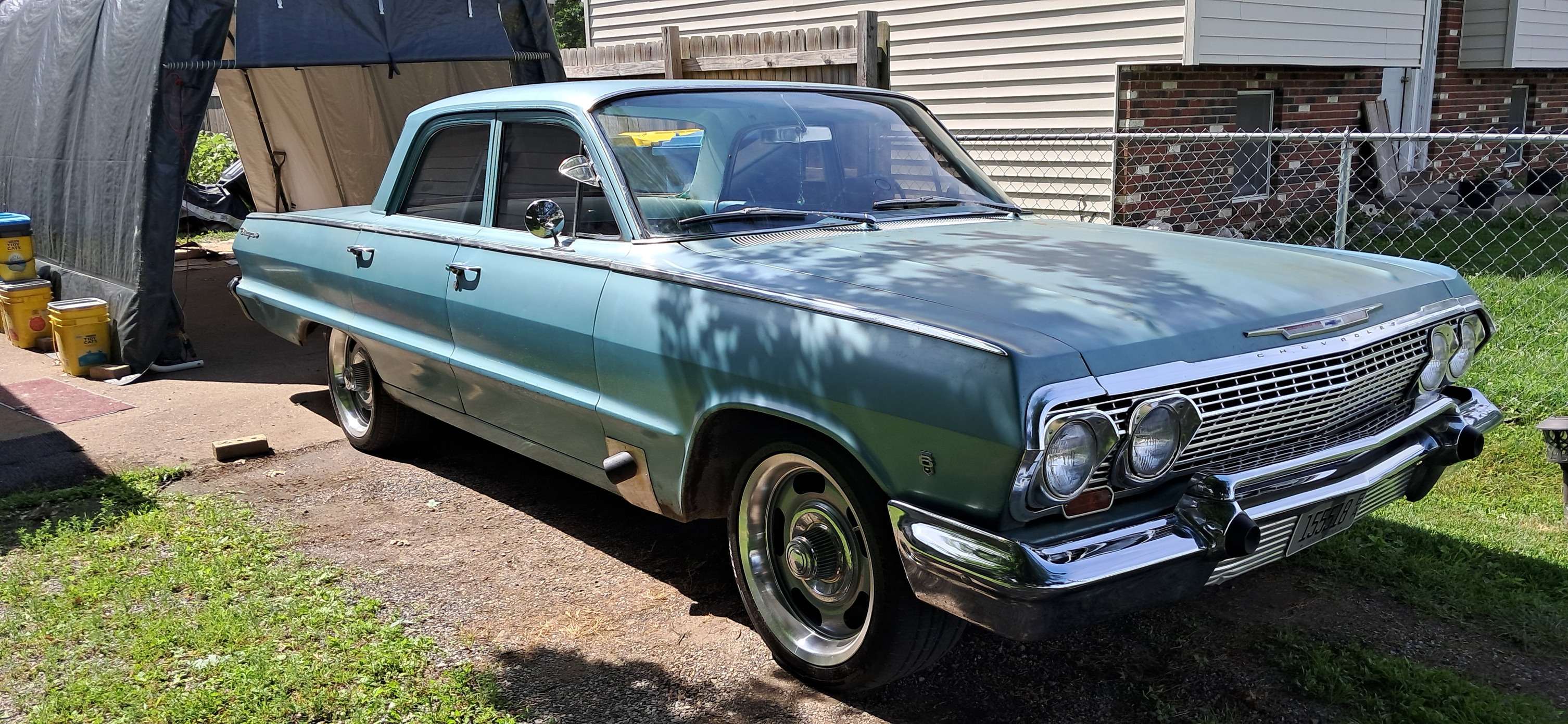 My 63 impala 283 with 3 on the tree with overdrive
