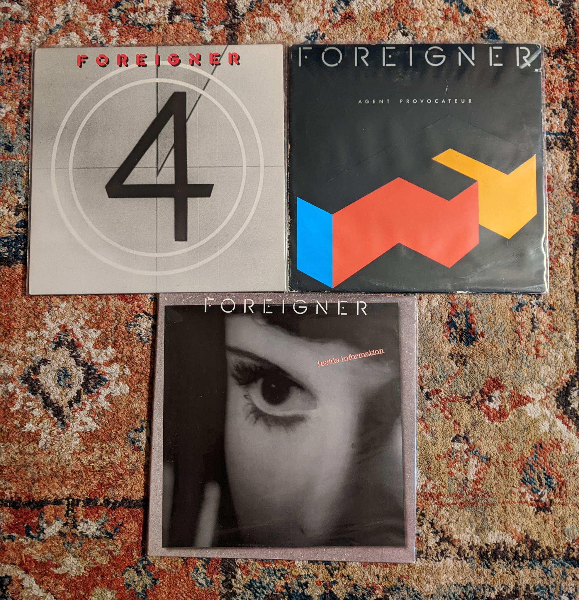 Foreigner and Asia vinyl records from the 80s