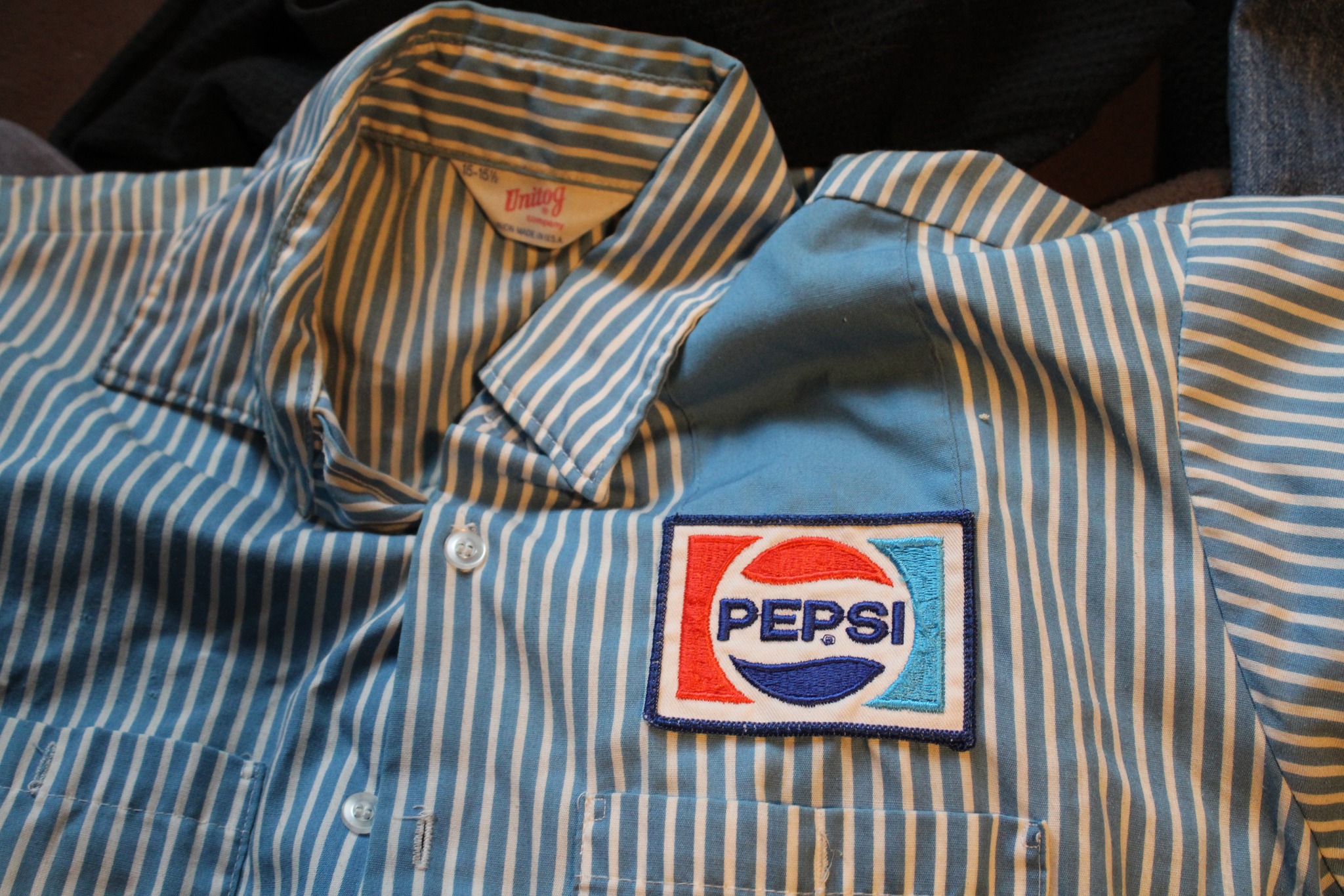 A scrimmage vest with sponsors Coke, United Airlines, Ronald 
