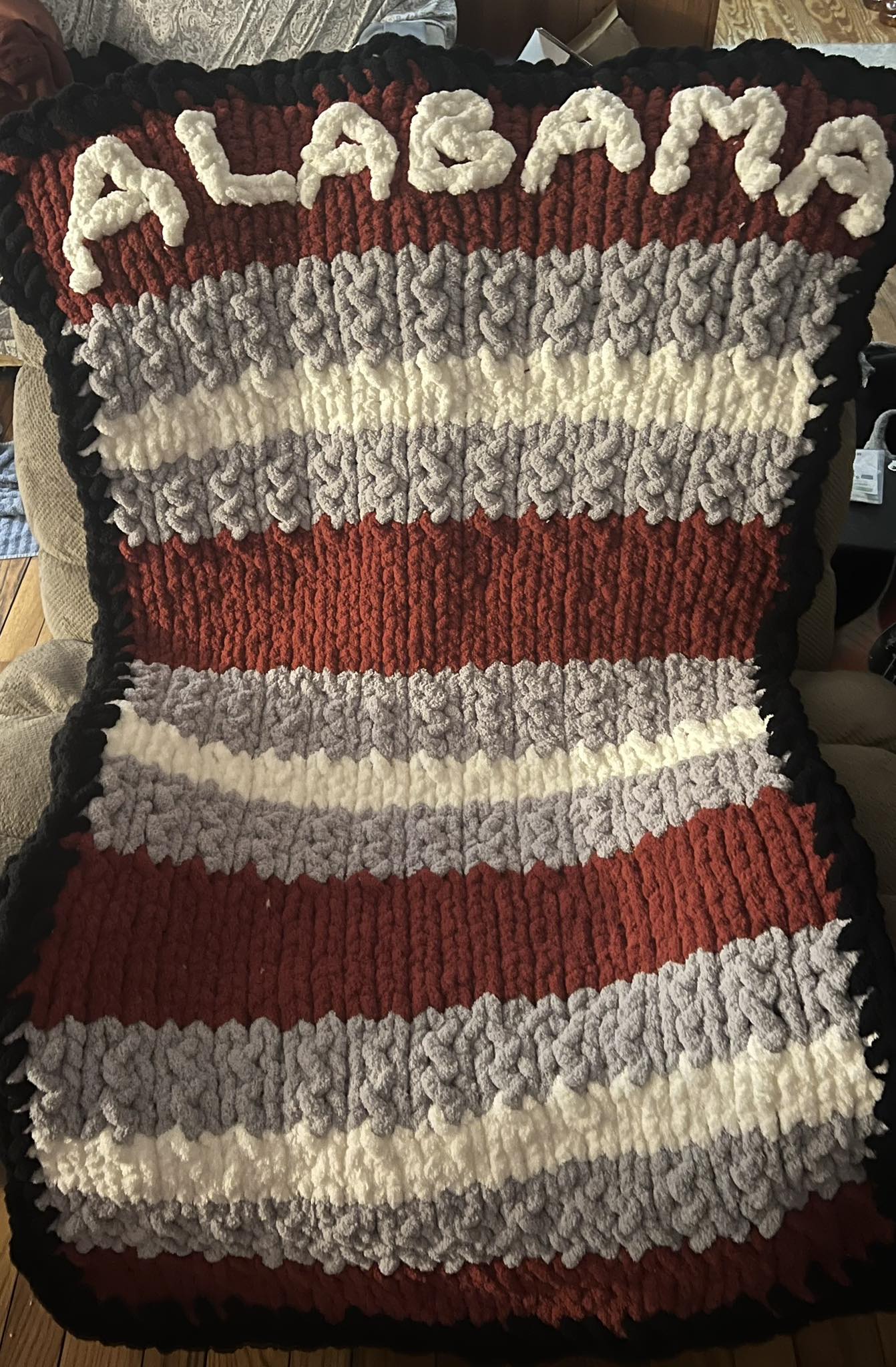 Handmade throw blanket with border and letters
