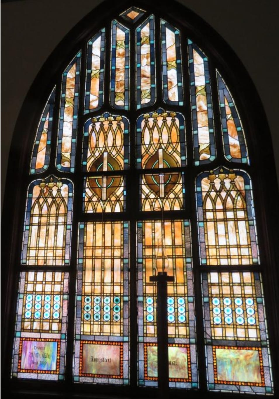 It turns out these are original Tiffany stained glass windows