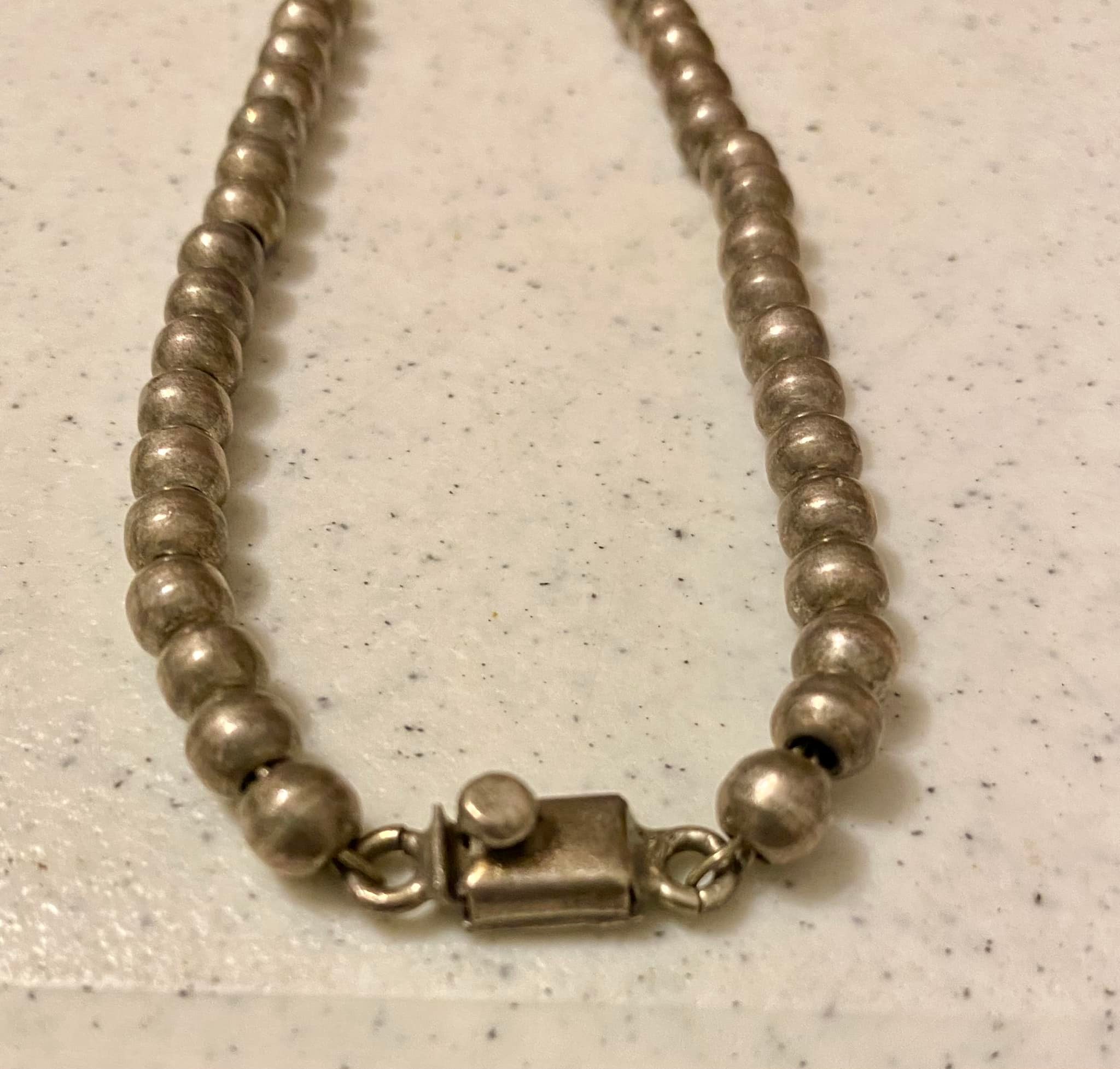 What is the meaning of 925 Mexico on a vintage necklace?