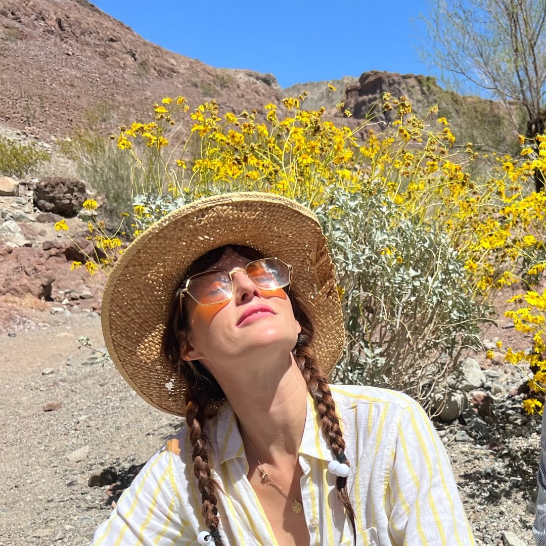 I'm singing to the flowers with a song I wrote about the flowers. Their ...