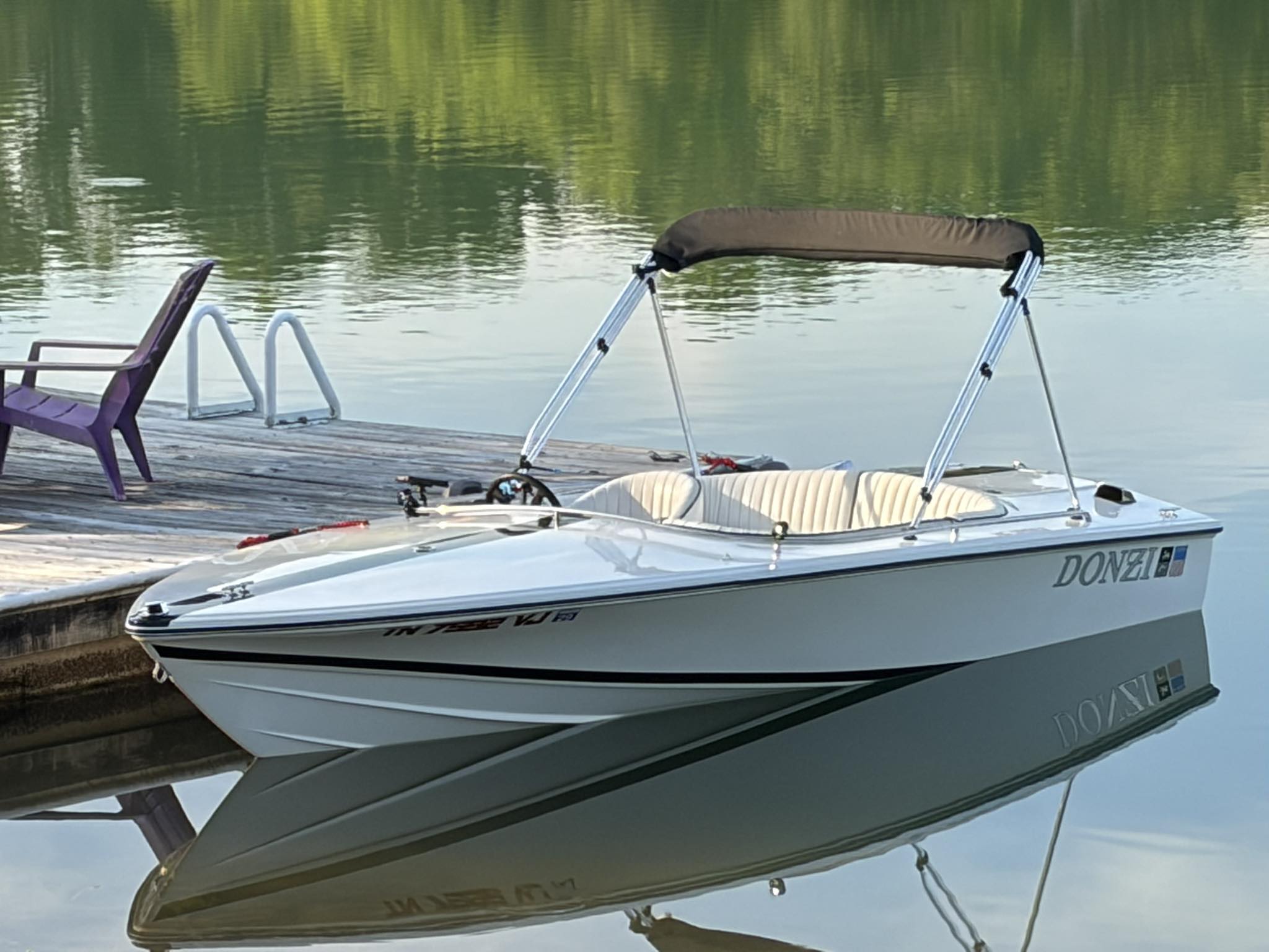 1990 Sweet 16. Restored this winter and a new motor. Runs and