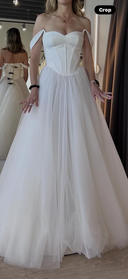 I just found out I'm pregnant but I'm getting married August 1st. I bought my dress already. Is this a dress that I can wear pregnant and still have it look nice?