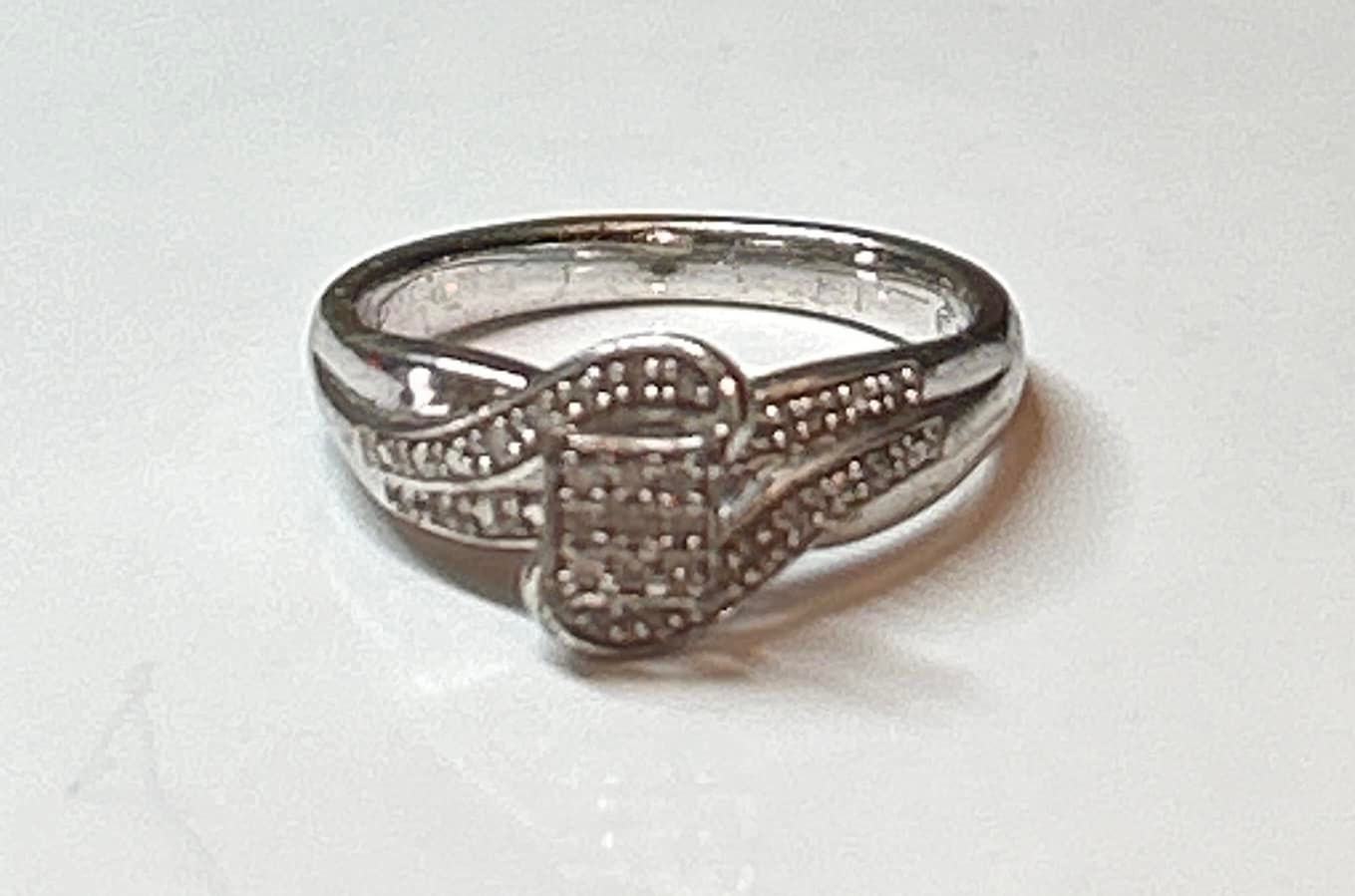Any information on the EC sterling silver diamond mark?
