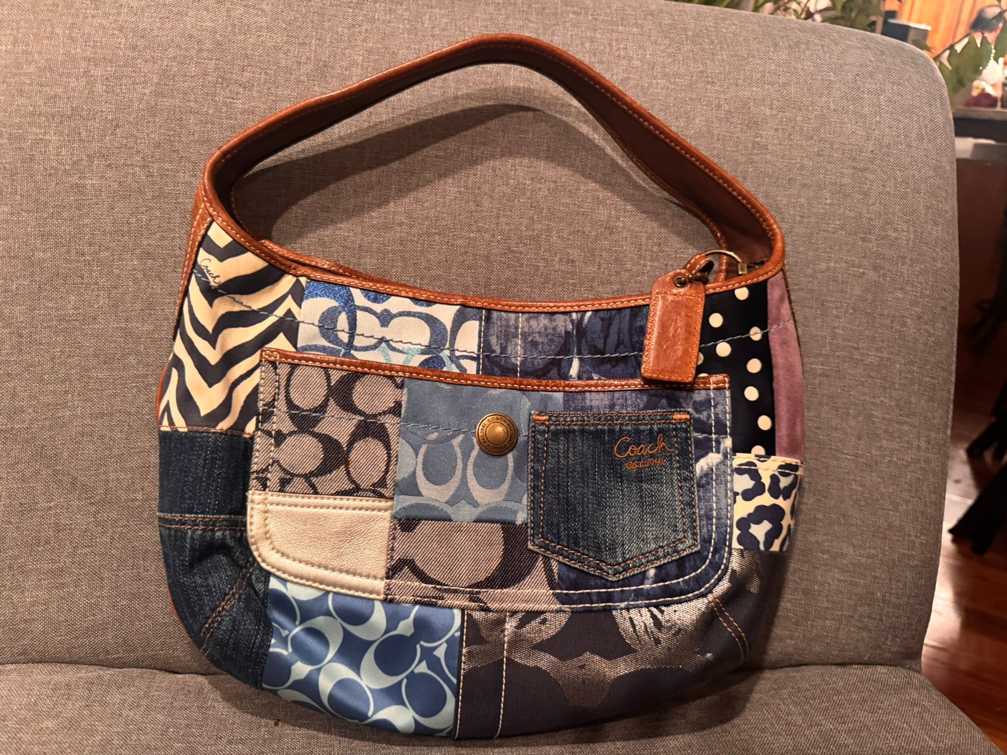 Coach patchwork hobo shoulder bag featuring a mix of denim 