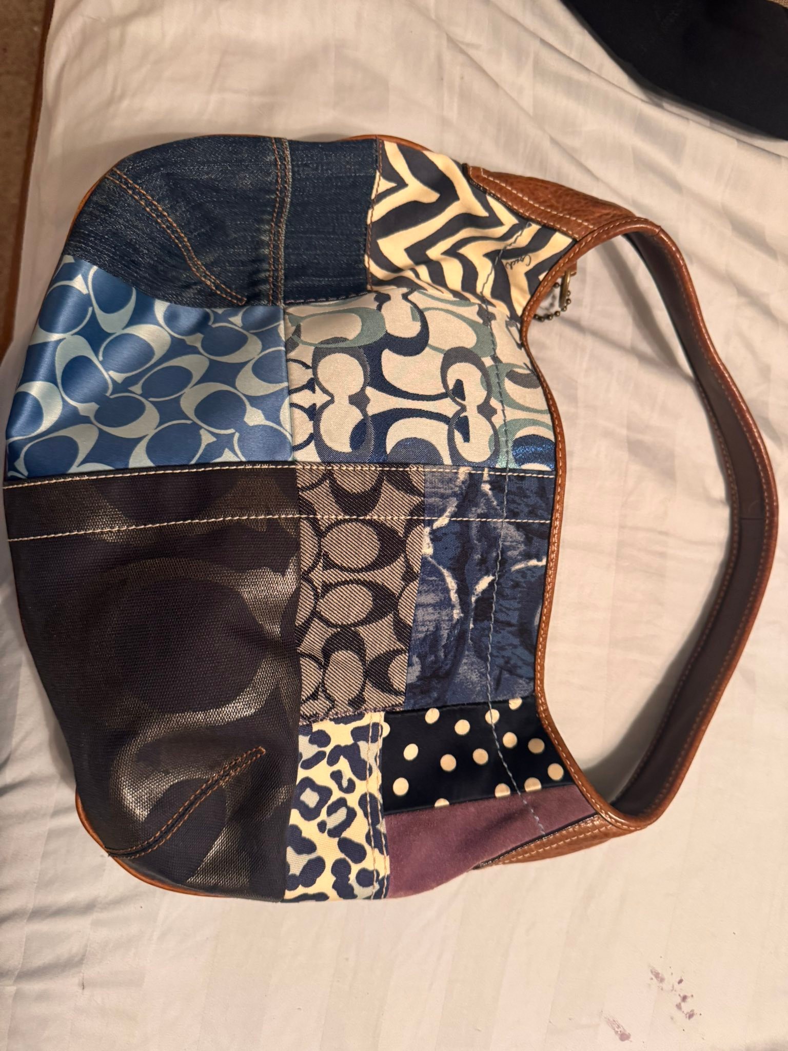 Coach patchwork hobo shoulder bag featuring a mix of denim 