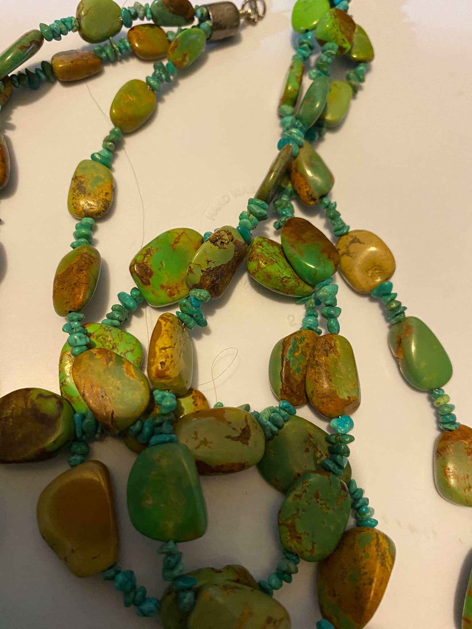 What does DT/R stand for on a 925 signed necklace?