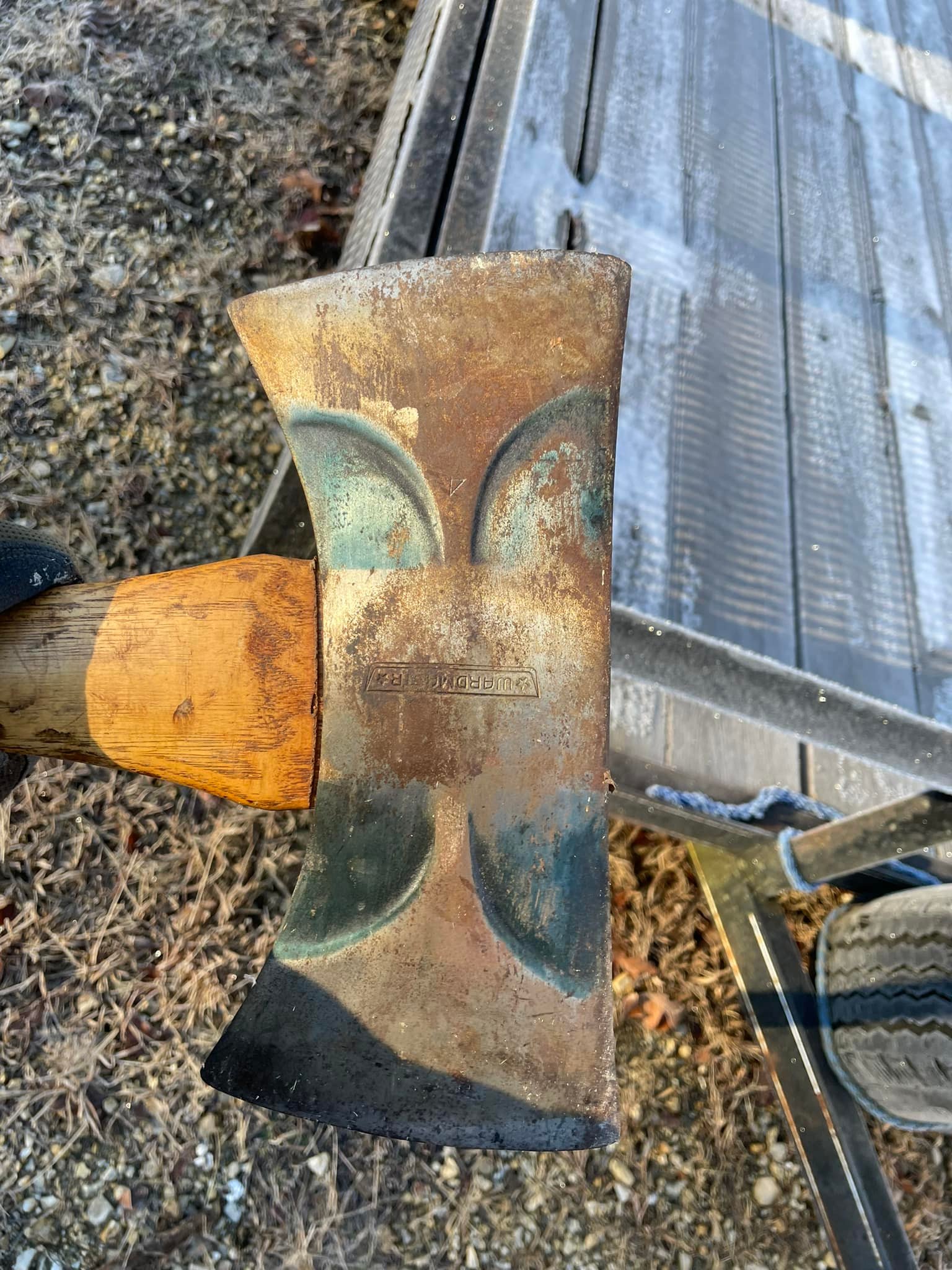 What is the quality and age of Montgomery Ward's double bit axe?