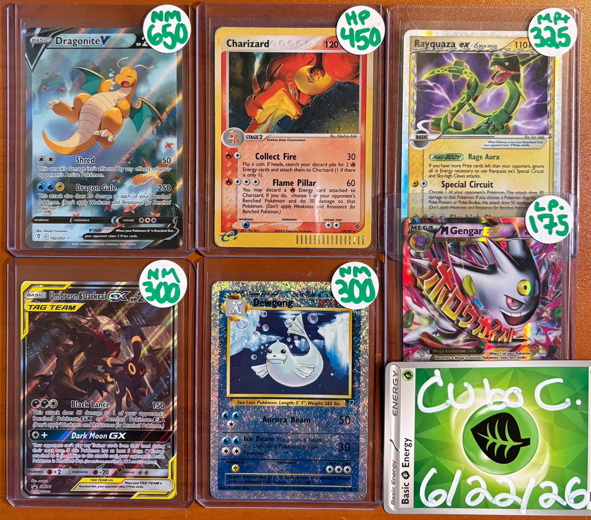 Pokemon cards for sale, including Dragonite and Charizard