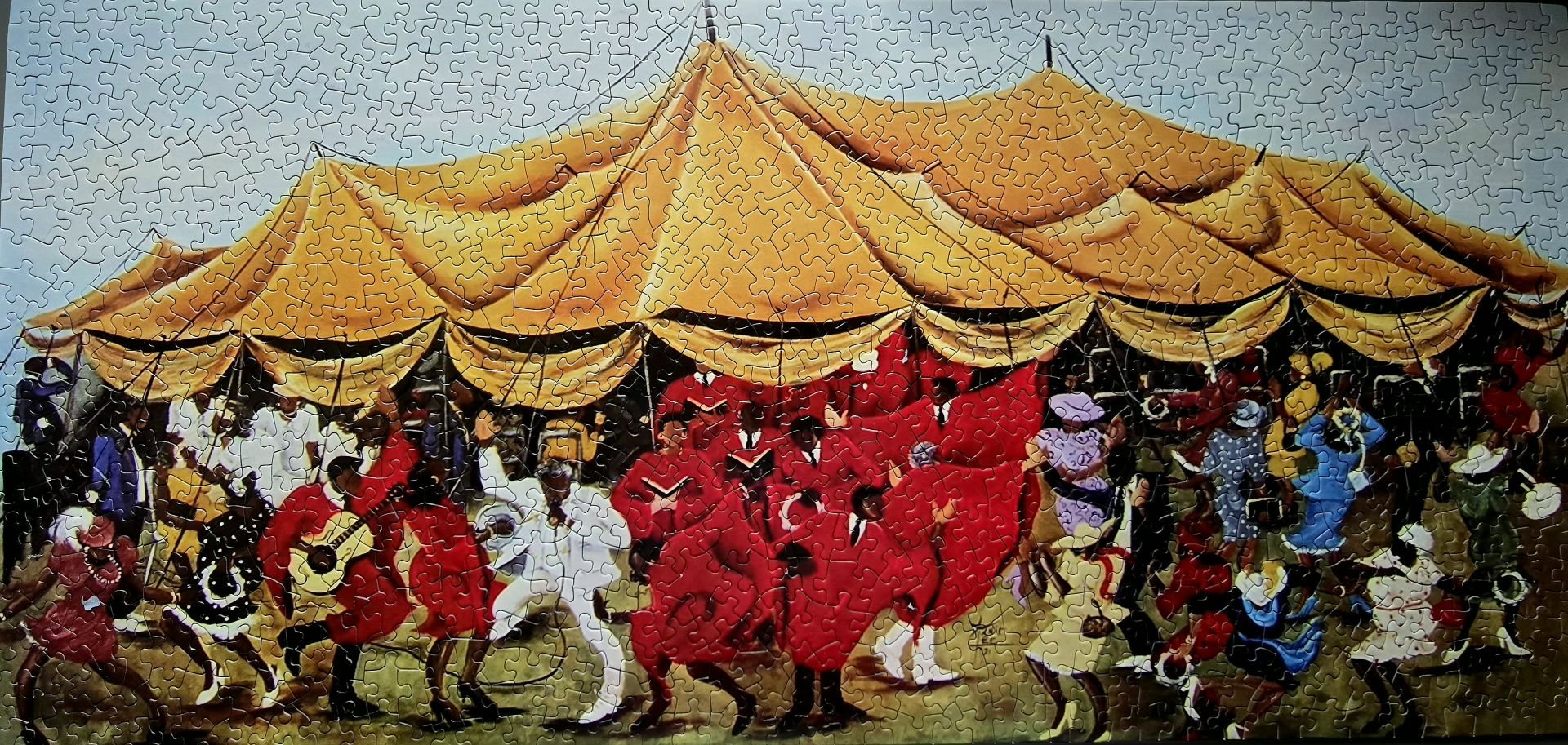 Completed 1000-piece jigsaw puzzle of colorful dancers under a