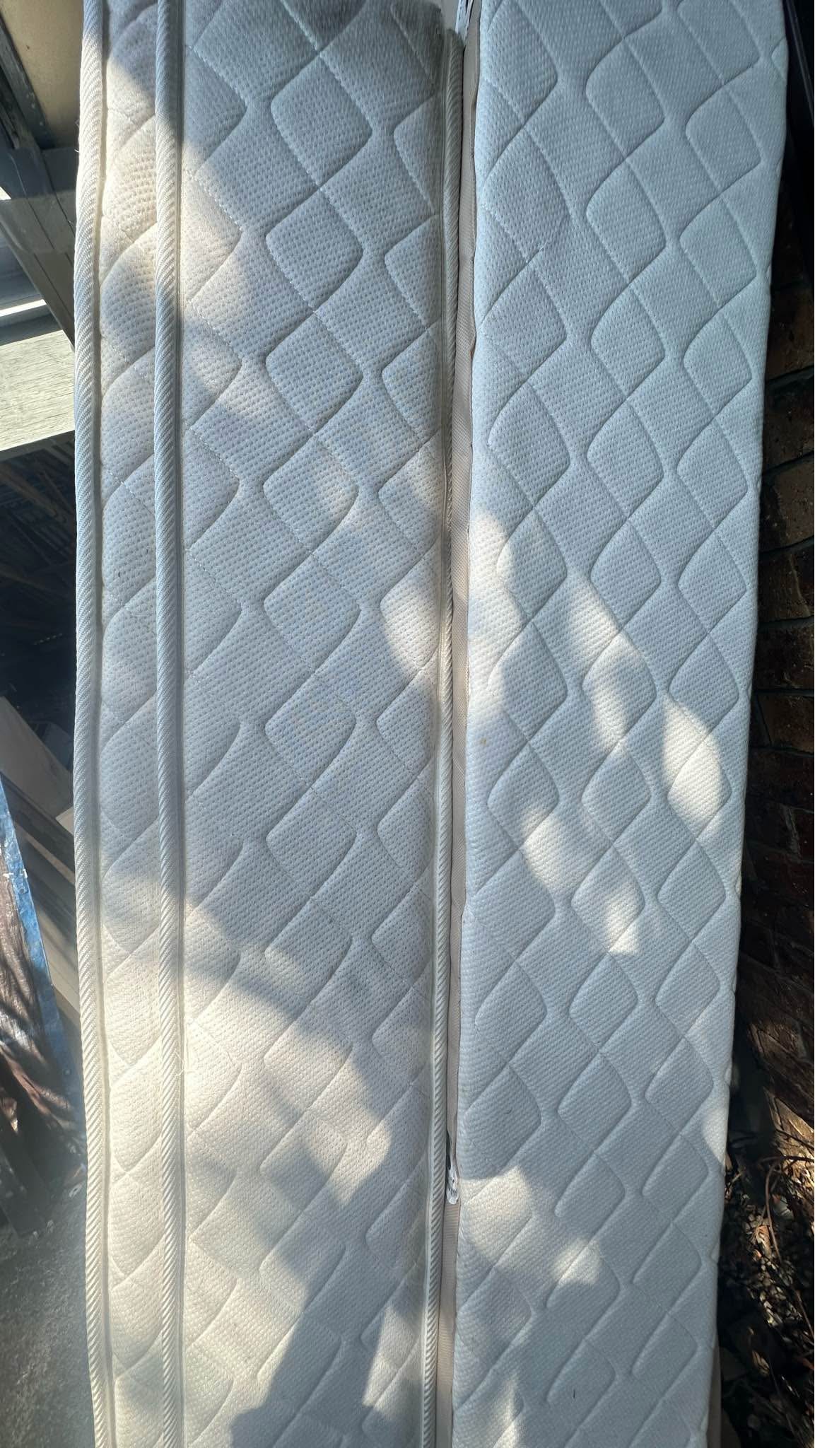 Pillow top king single ensemble bed.