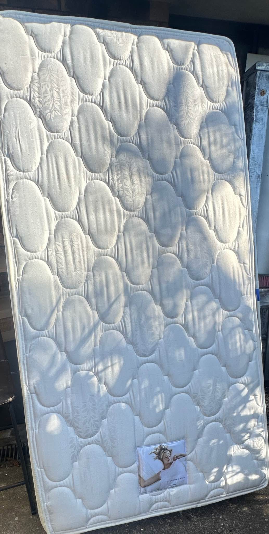 Pillow top king single ensemble bed.